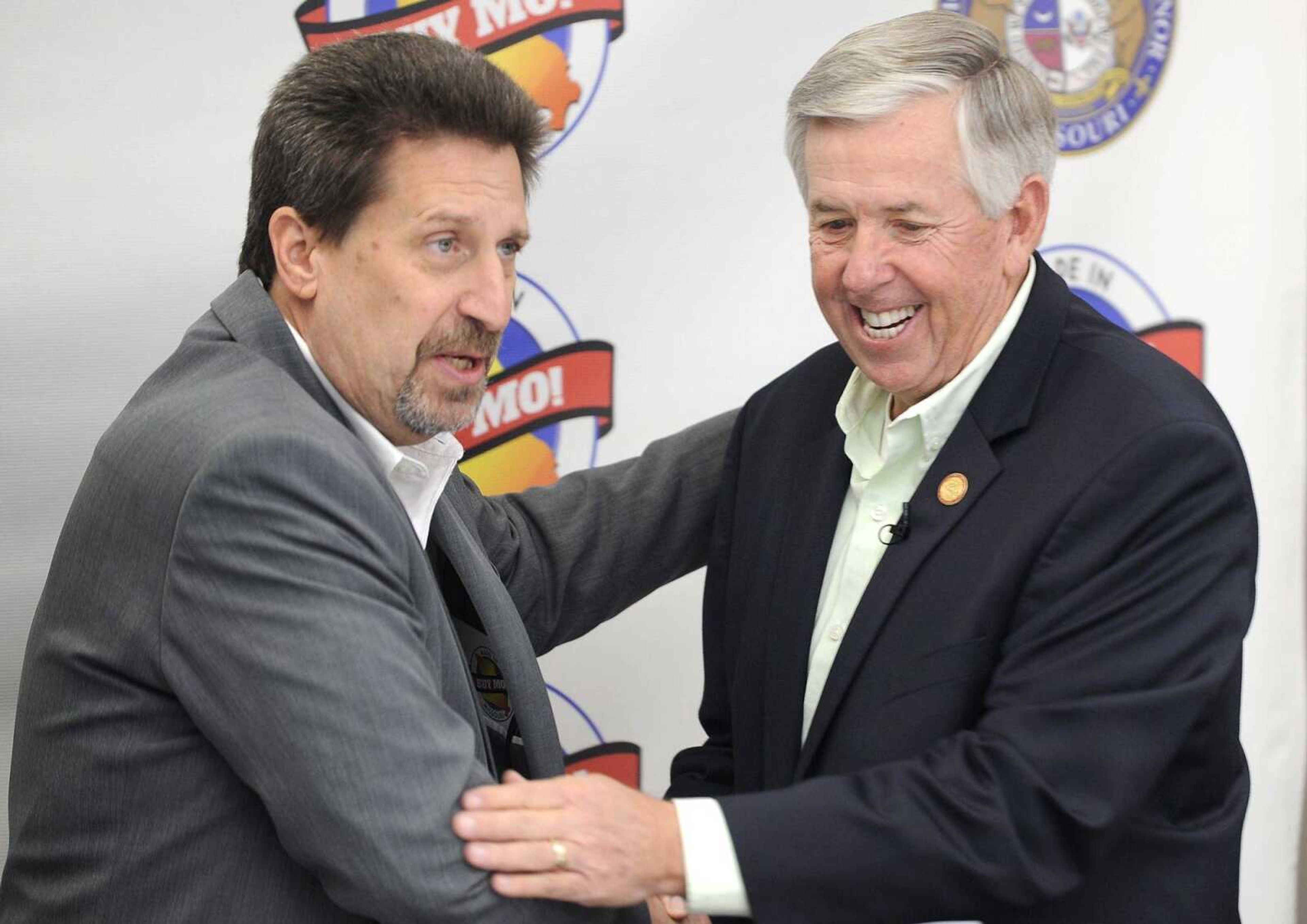 John Mehner, left, president and CEO of the Cape Girardeau Area Chamber of Commerce, introduces Lt. Gov. Mike Parson on Wednesday in Cape Girardeau.