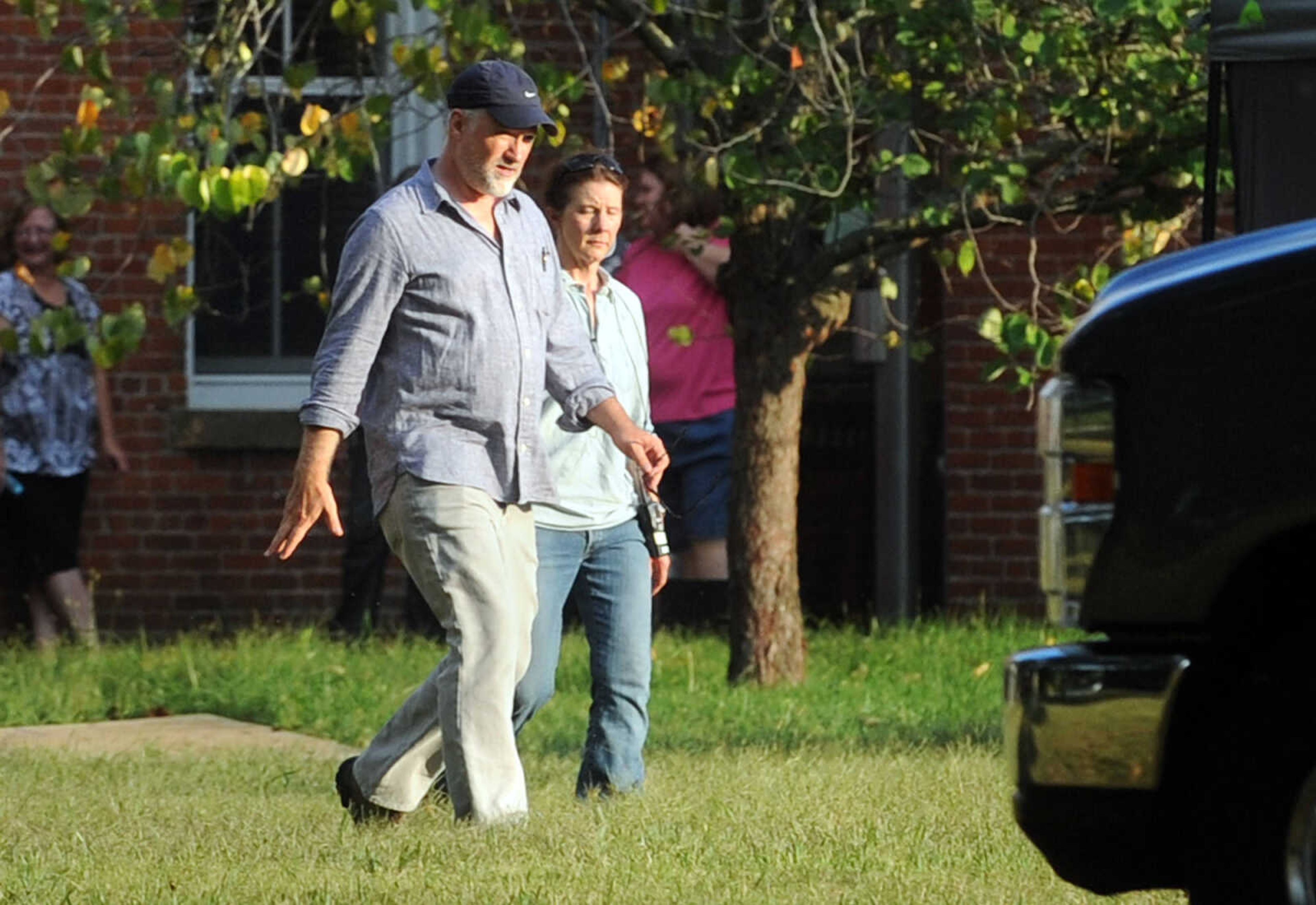 LAURA SIMON ~ lsimon@semissourian.com

Director David Fincher walks across the lawn of the Common Pleas Courthouse during setup for a scene for 20th Century Fox's feature film "Gone Girl", Thursday, Oct. 3, 2013, in Cape Girardeau.