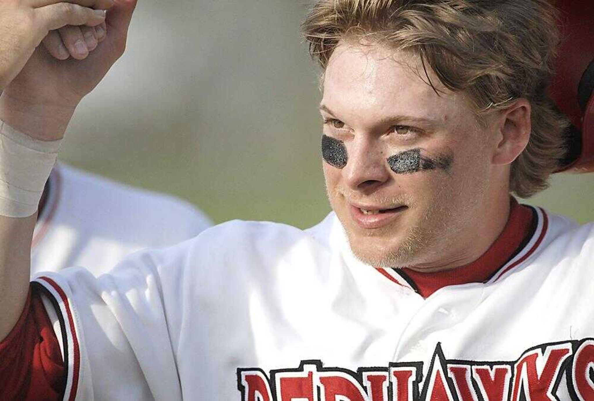 Robby Moore received congratulations from his Redhawks teammates after scoring during the second game against Tennessee-Martin at Capaha Park on Saturday. (Kit Doyle)