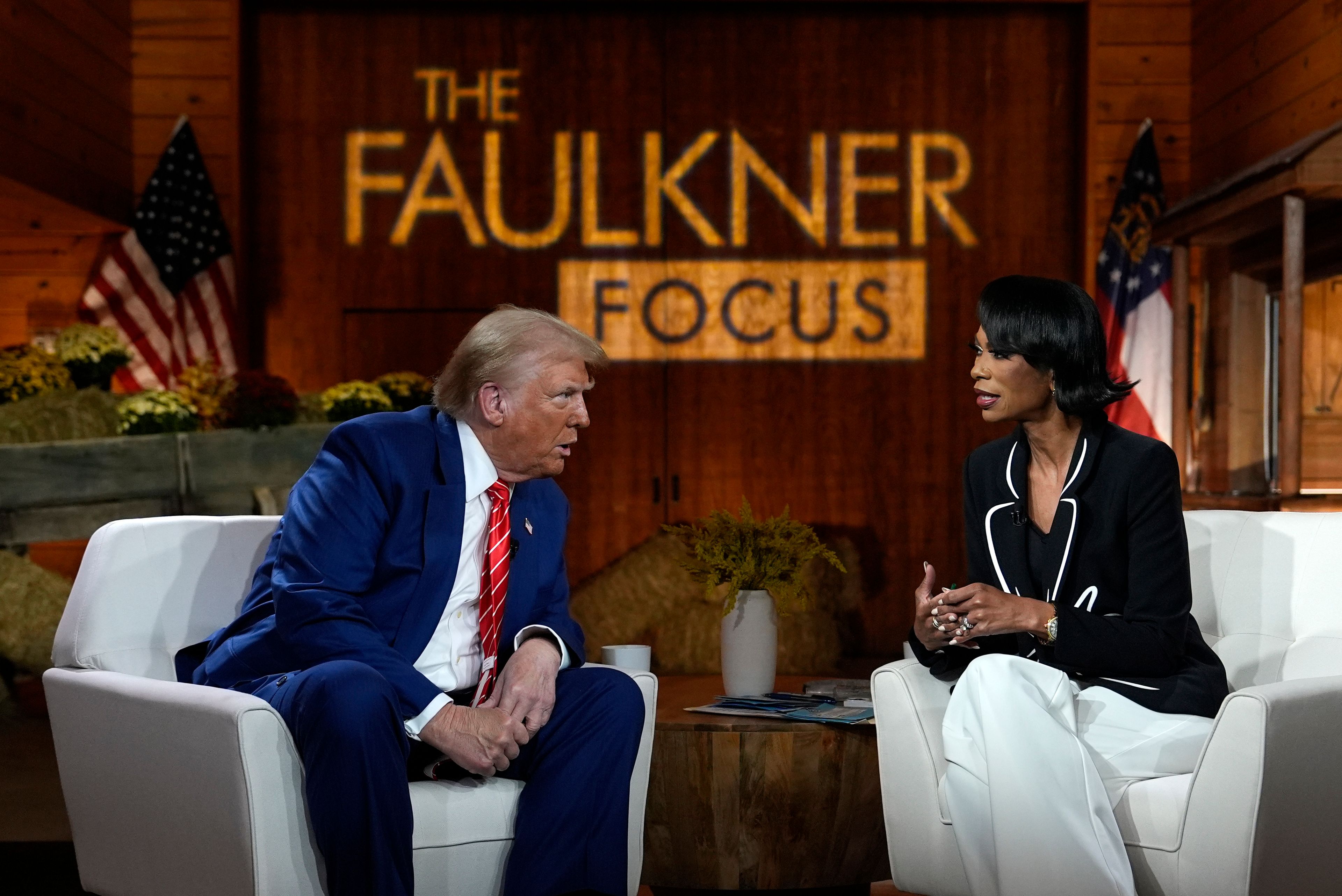 Republican presidential nominee former President Donald Trump speaks during a break in a Fox News town hall with Harris Faulkner at The Reid Barn, Tuesday, Oct. 15, 2024, in Cumming, Ga. (AP Photo/Julia Demaree Nikhinson)