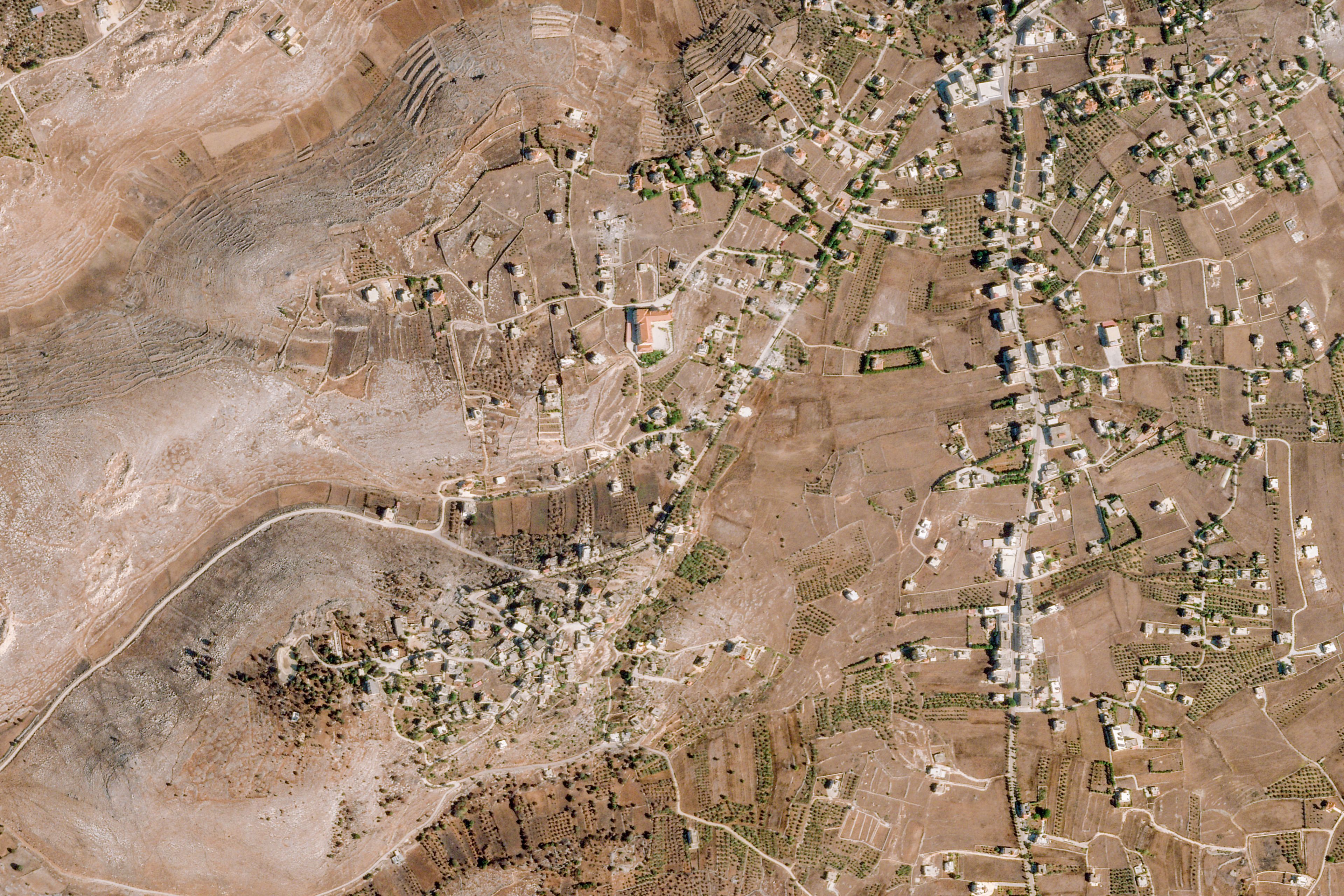 This Sept. 26, 2024, satellite image from Planet Labs PBC shows the village of Mhaibib in southern Lebanon. (Planet Labs PBC via AP)