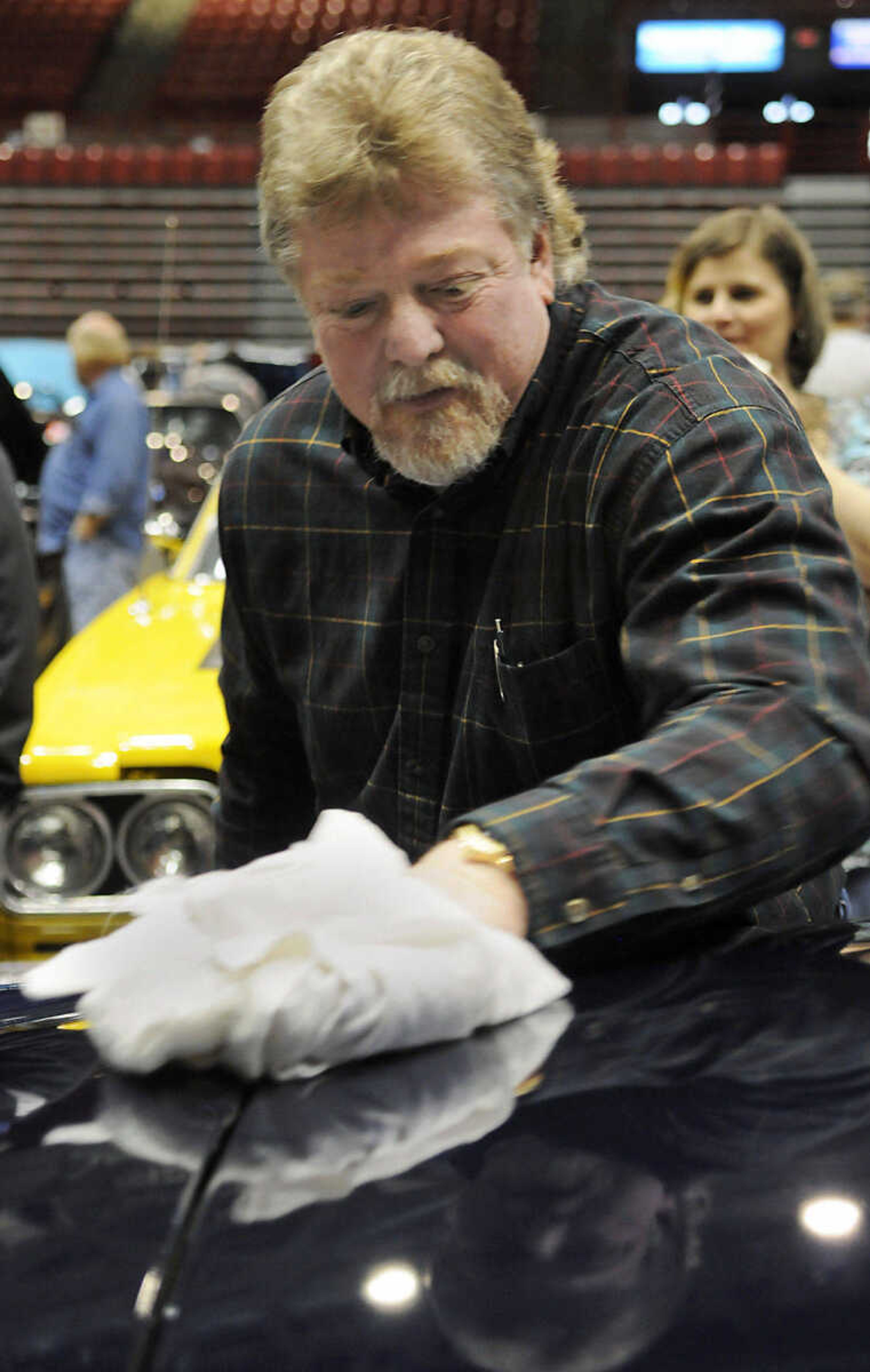 KRISTIN EBERTS ~ keberts@semissourian.com

Tim Johns, of Atoka, Tenn., is polishes his 1950 Ford Coupe before it goes to bidding during Smith's Classic Car Auction at the Show Me Center on Saturday, March 6, 2010.