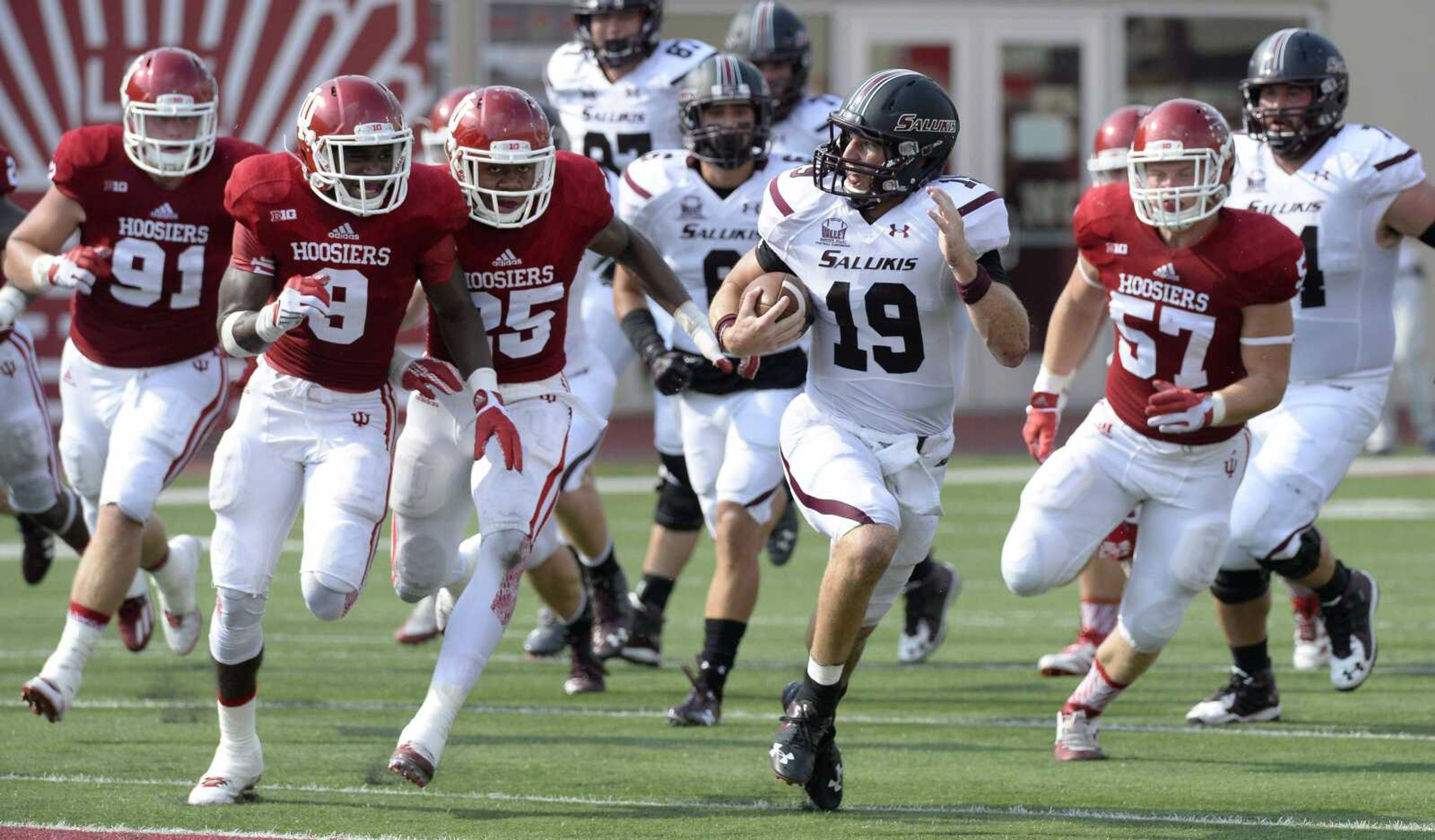 Southern Illinois quarterback Mark Iannotti (19) gets through the line during an NCAA college football game against Indiana, Saturday, Sept. 5, 2015, in Bloomington, Ind. (Chris Howell/The Herald-Times via AP) MANDATORY CREDIT