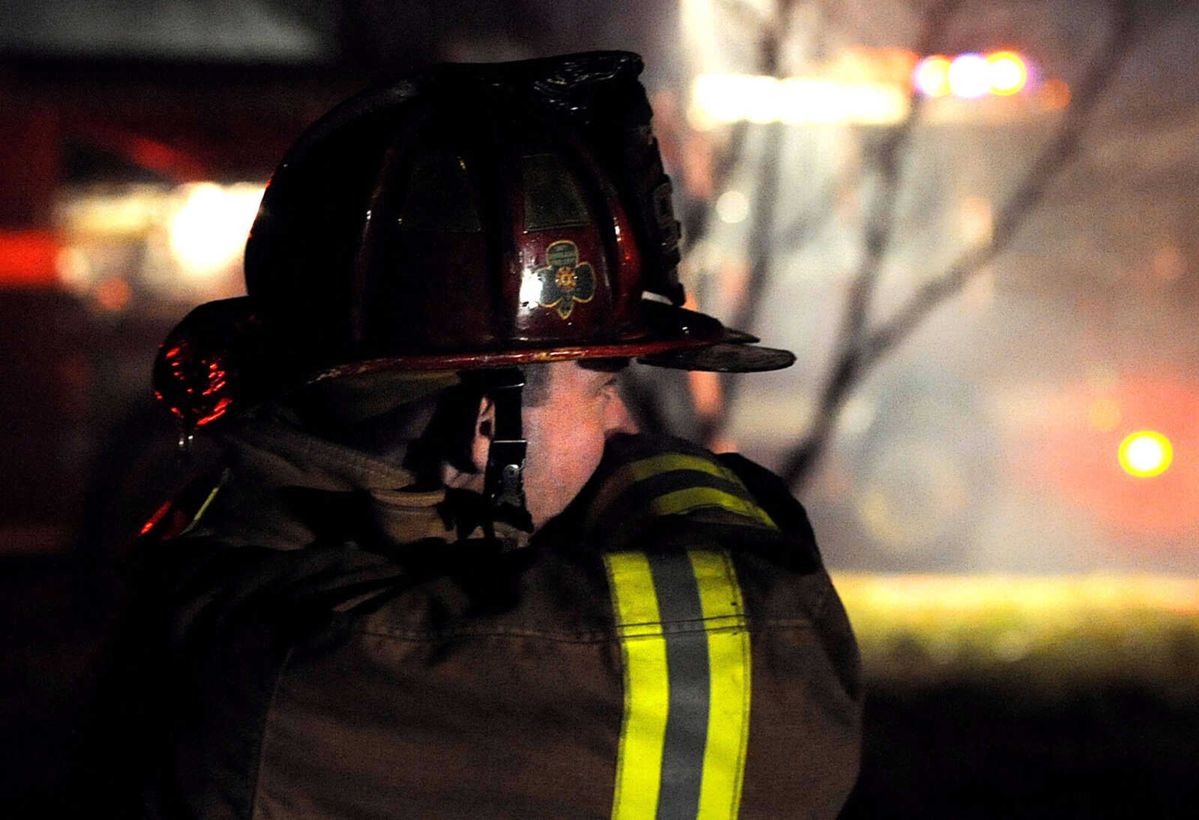 LAURA SIMON ~ lsimon@semissourian.com
Firefighters from Delta, Gordonville, Cape Girardeau, Millersville, Fruitland and East County Fire Departments battle a structure fire Wednesday night, January 9, 2012 on Onyx Lane in Cape Girardeau.