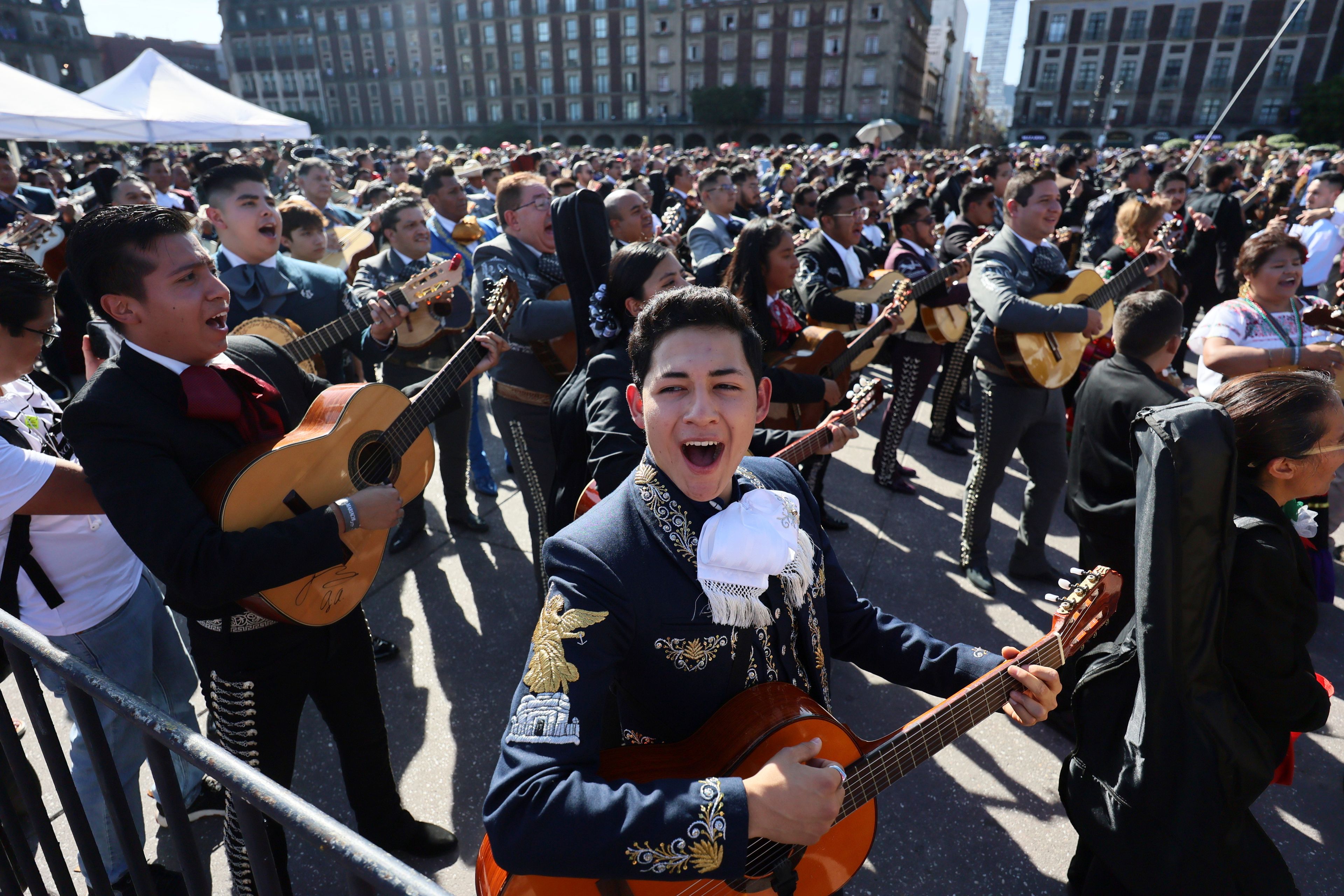 Musicians gather to break the record of most mariachis performing in unison, at the Zocalo, Mexico City's main square, Sunday, Nov. 10, 2024. (AP Photo/Ginnette Riquelme)