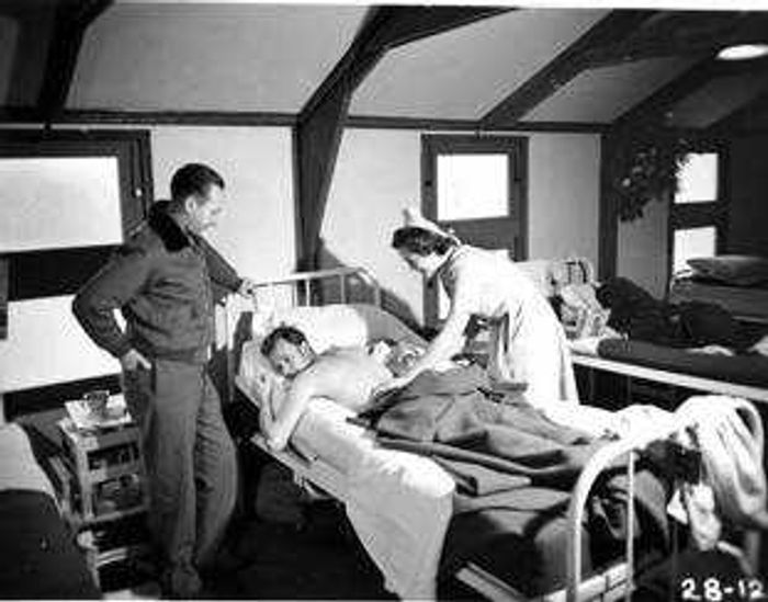 T-Sgt. Homer Schurbusch in a hospital bed in Russia after his plane, the "Ditney Hill" was shot down in World War II.