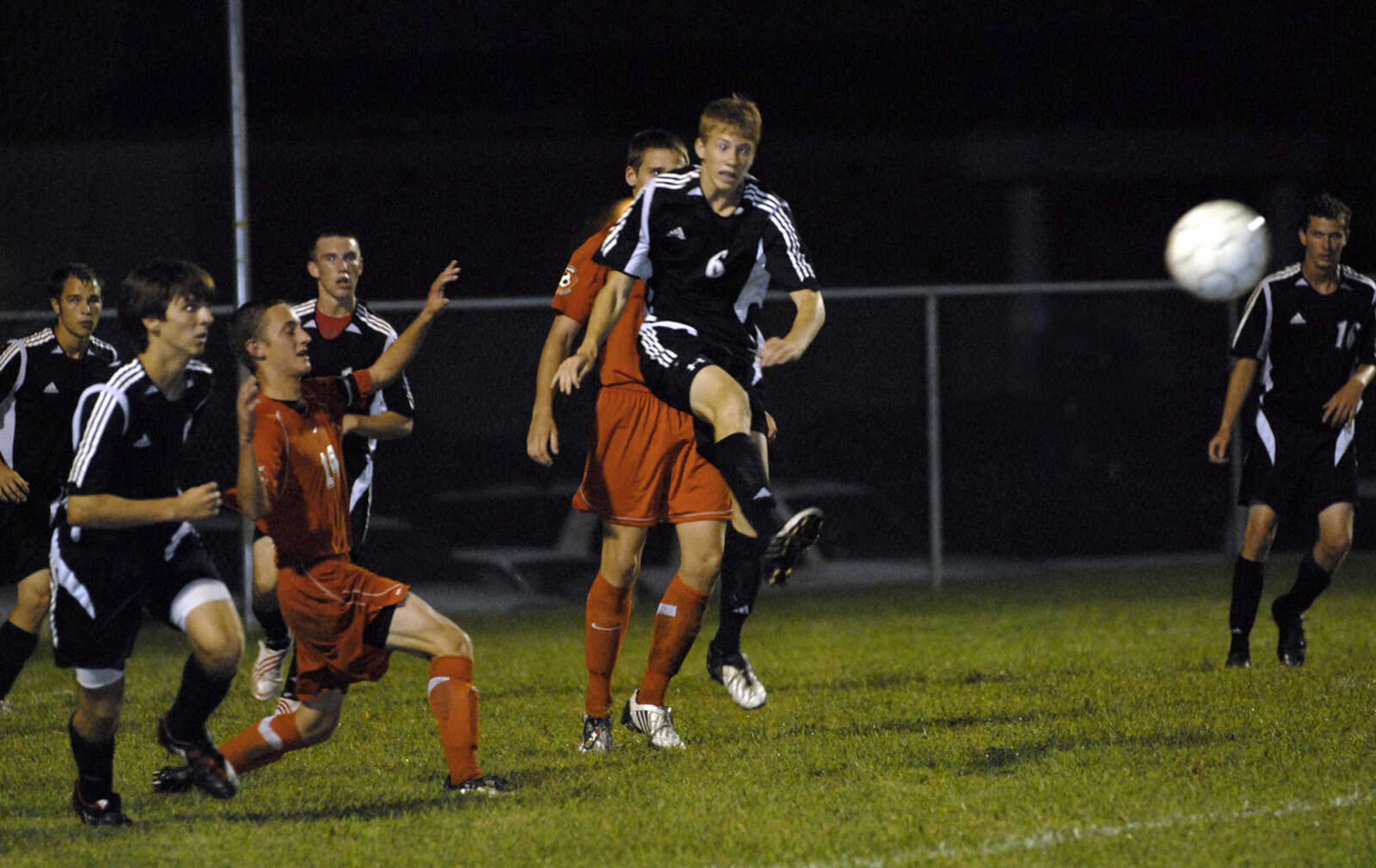 FRED LYNCH ~ flynch@semissourian.com
Jackson's Ryan Schlick kicks the ball past Central defenders during the second half Tuesday at Central.