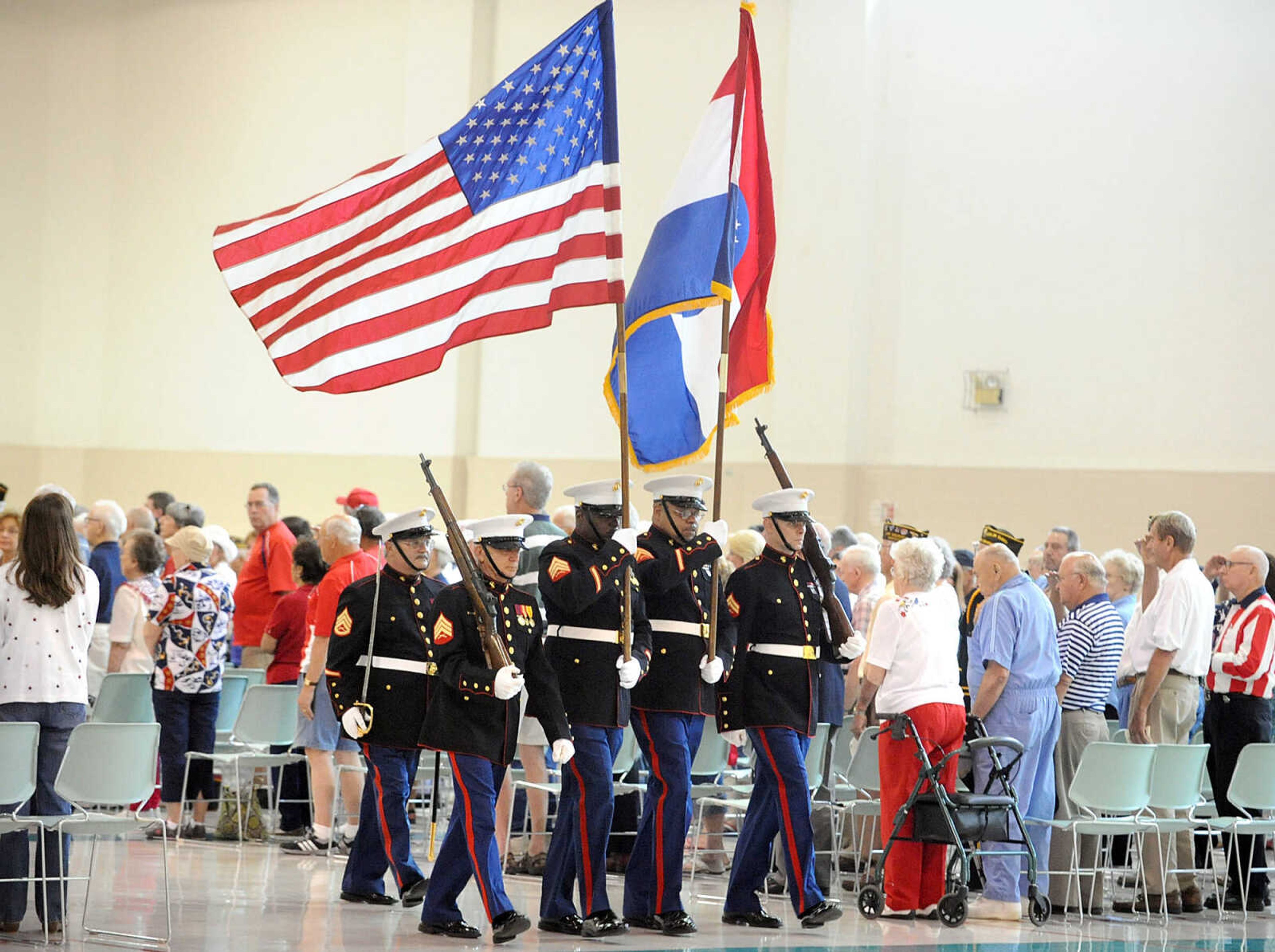 LAURA SIMON ~ lsimon@semissourian.com
Members of the Marine Corps League retire the colors Monday, May 28, 2012 during the Joint Veterans Council Memorial Service at the Osage Centre in Cape Girardeau.