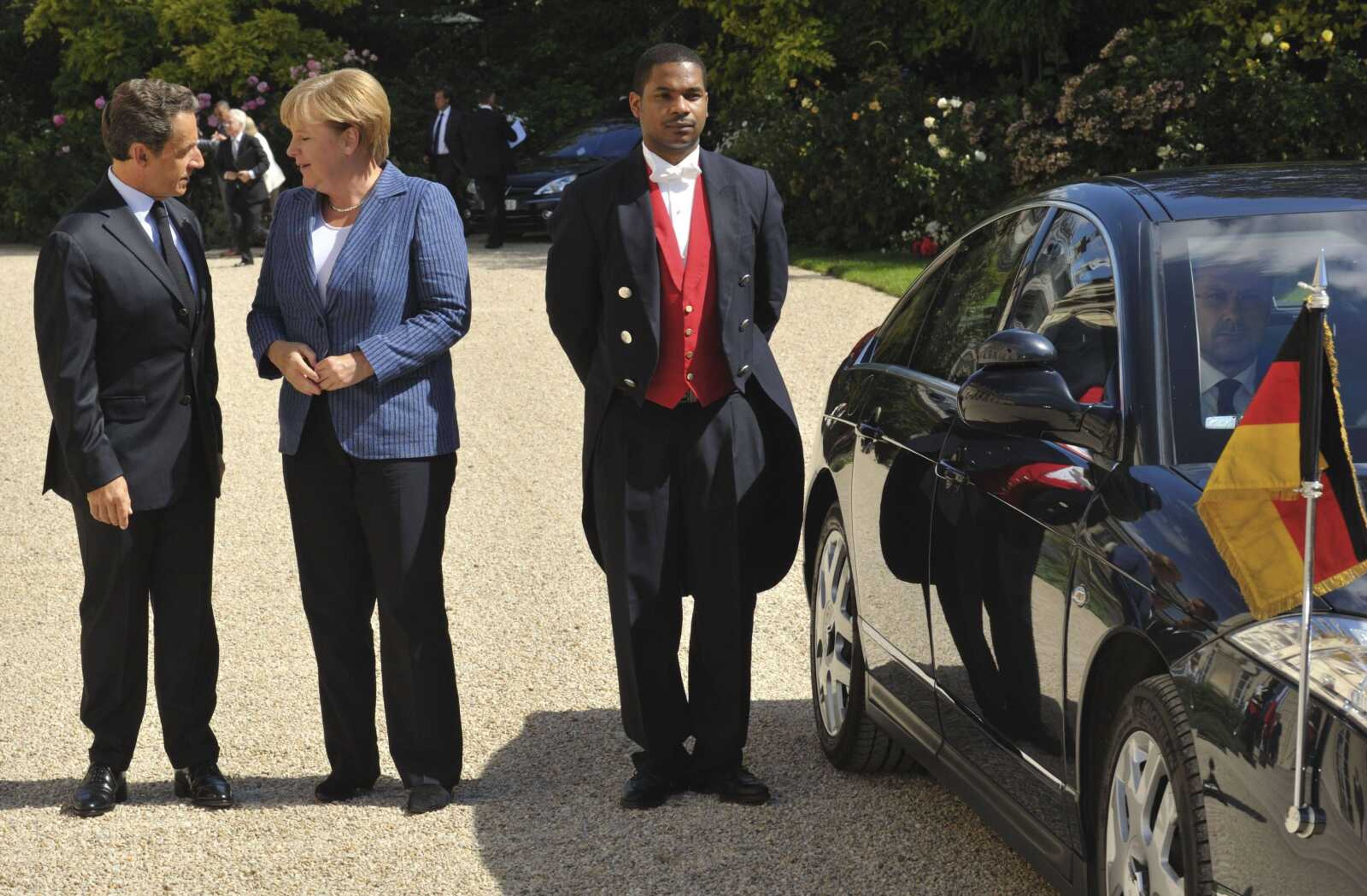 France&#8217;s President Nicolas Sarkozy, left, welcomes German Chancellor Angela Merkel at the Elysee Palace, in Paris Tuesday Aug. 16, 2011. The leaders of Germany and France met Tuesday to discuss Europe&#8217;s debt crisis as new figures show their economies stalled even before the latest bout of turmoil struck financial markets. (AP Photo/Philippe Wojazer, Pool)