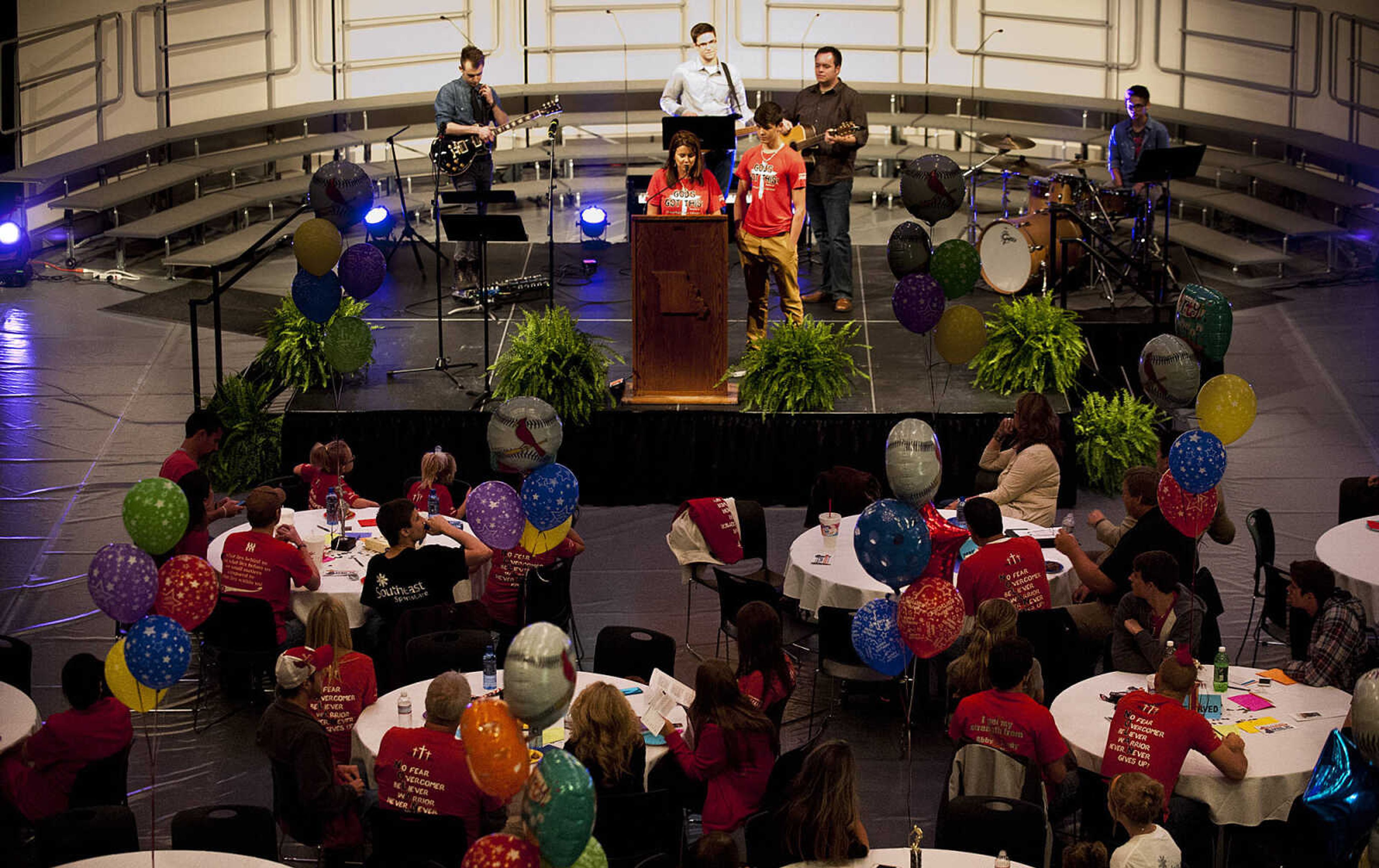 Rachelle, left, and Colton Weber welcome attendees to "Nolan Weber, Celebration of Life," Wednesday, April 30, at the Jackson High School Event Center. Friends, family and community members gathered to remember the former Jackson High School baseball and soccer player who passed away from brain cancer in December on what would have been Nolan's 19th birthday.