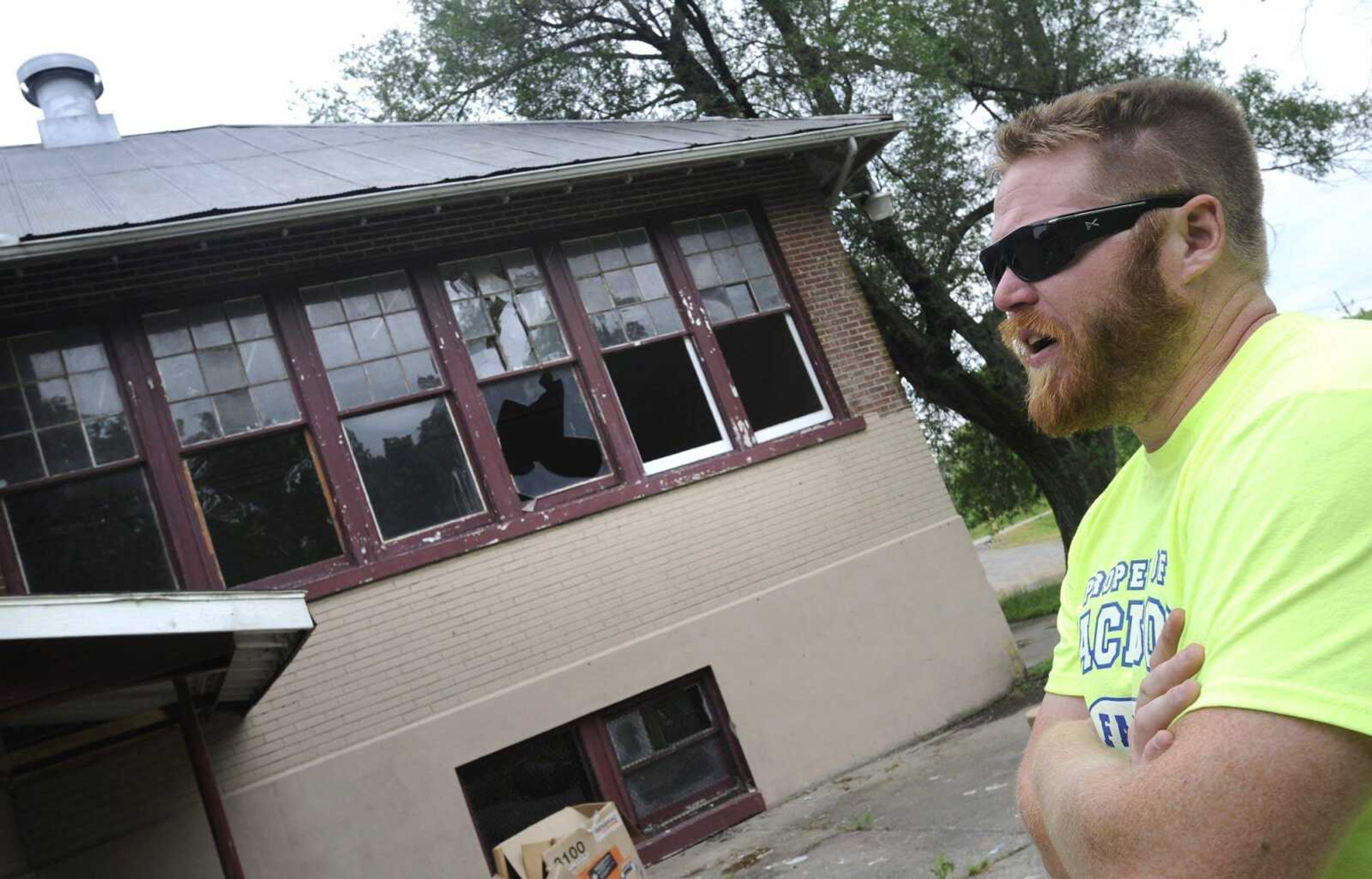 Quinn Strong talks about the former Pi Kappa Alpha fraternity house that he plans to renovate Tuesday, May 21, 2013 in Cape Girardeau. (Fred Lynch)