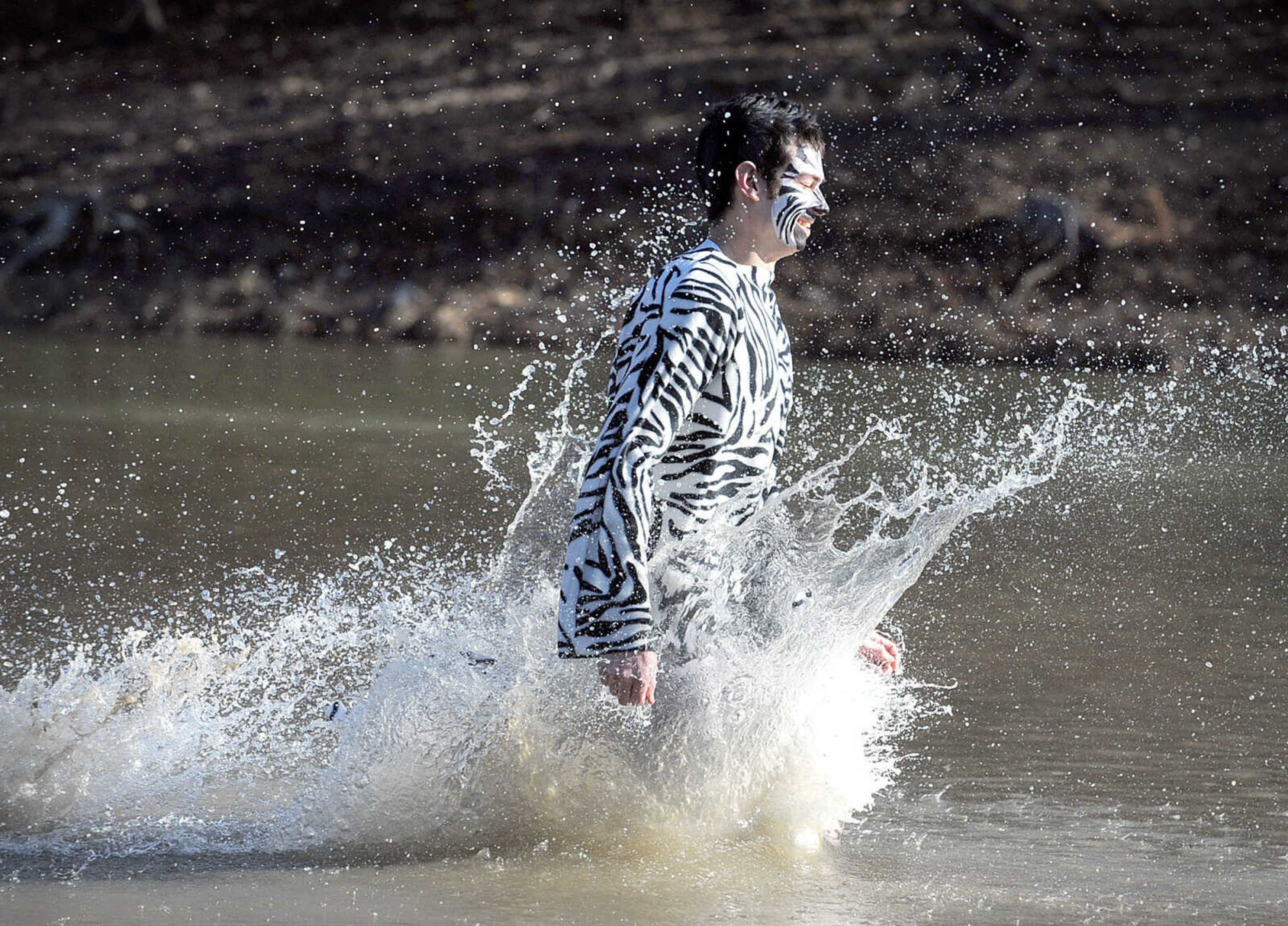 LAURA SIMON ~ lsimon@semissourian.com
People plunge into the cold waters of Lake Boutin Saturday afternoon, Feb. 2, 2013 during the Polar Plunge at Trail of Tears State Park. Thirty-six teams totaling 291 people took the annual plunge that benefits Special Olympics Missouri.