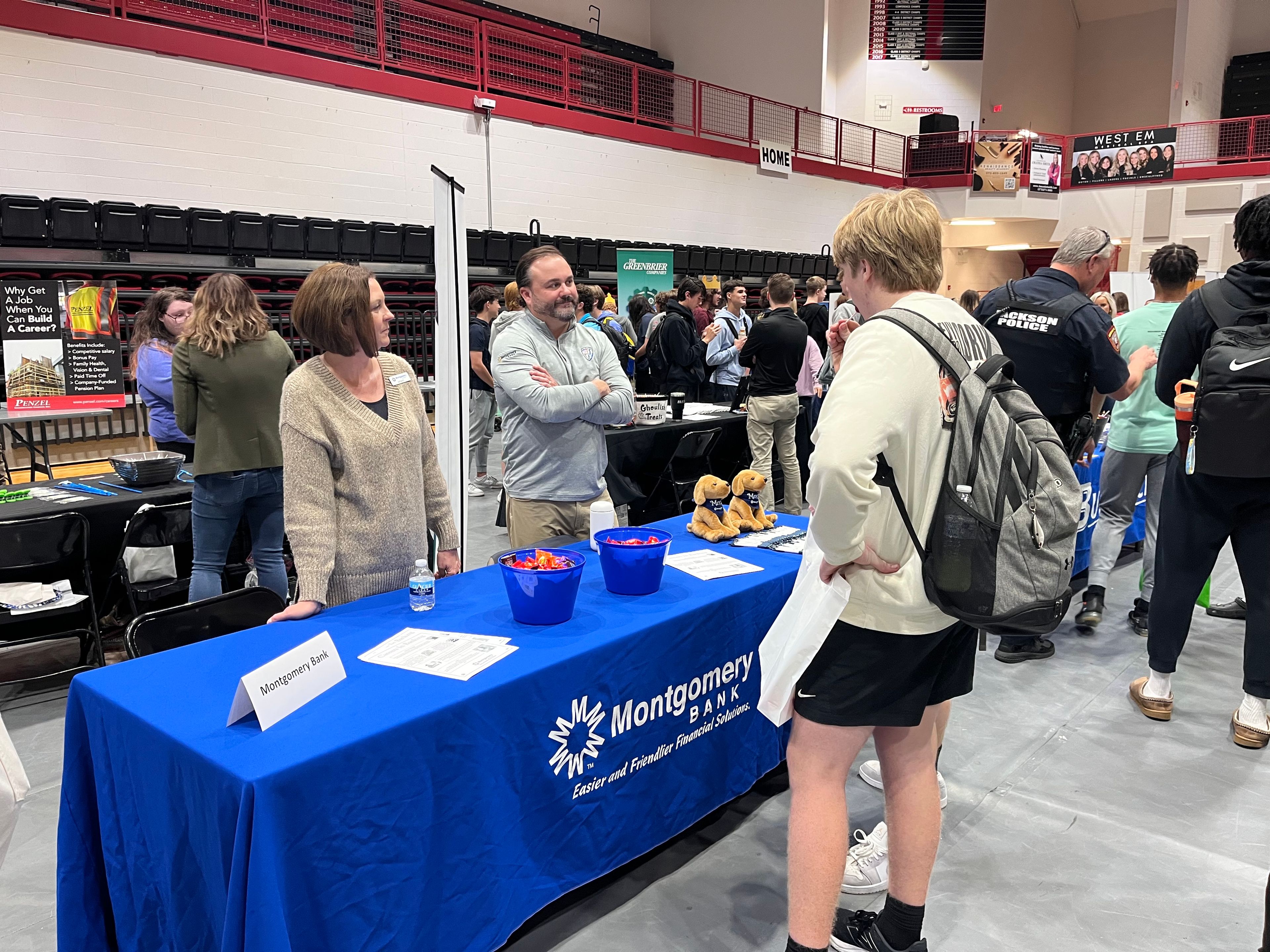 Jackson High School students speak with representatives of Montgomery Bank during the annual Jackson Opportunities in Business (J.O.B.) Fair on Wednesday at JHS. 