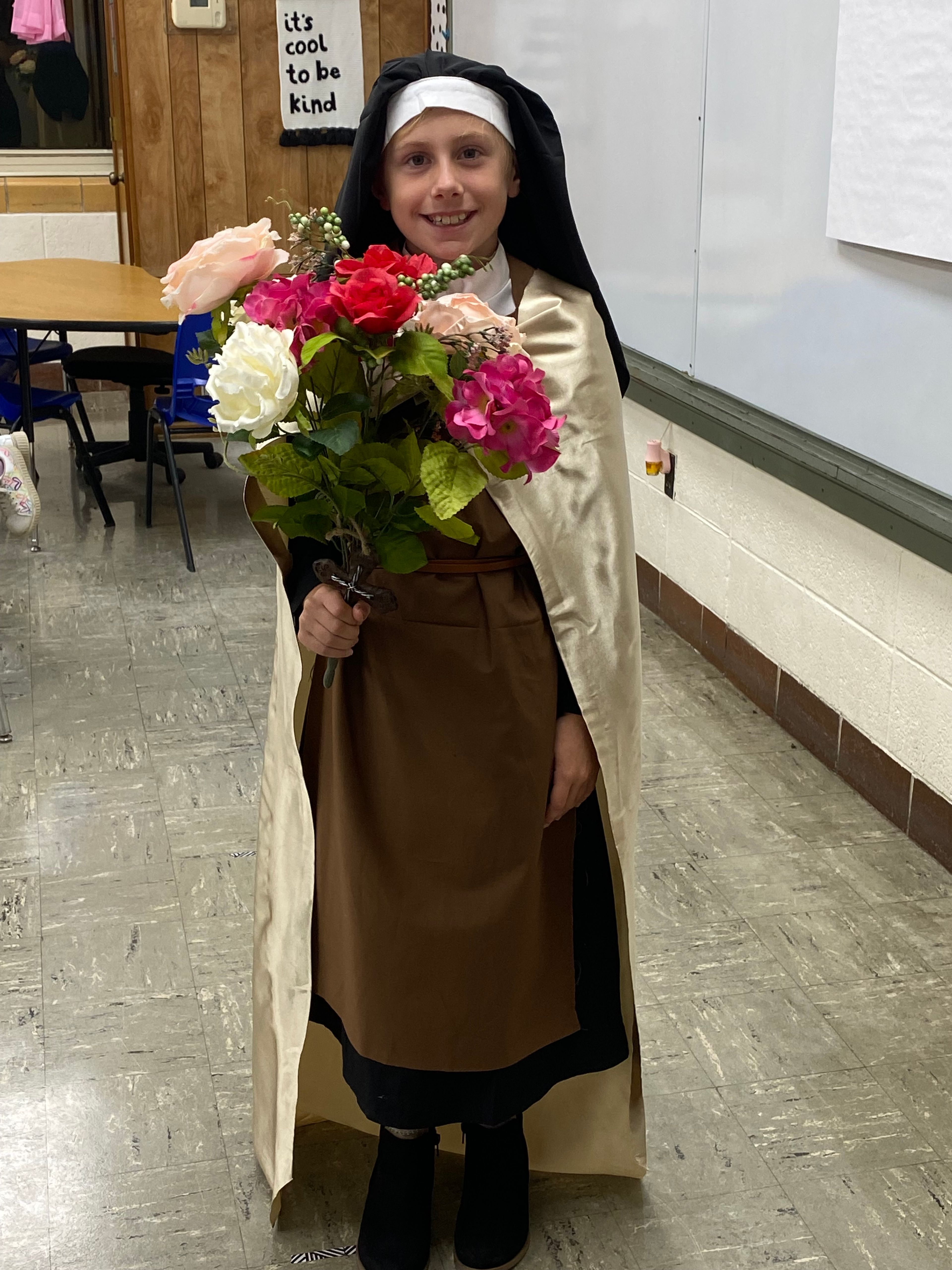 The solo student in 3rd grade was St. Therese the Little Flower (Aubrey Graviett).
