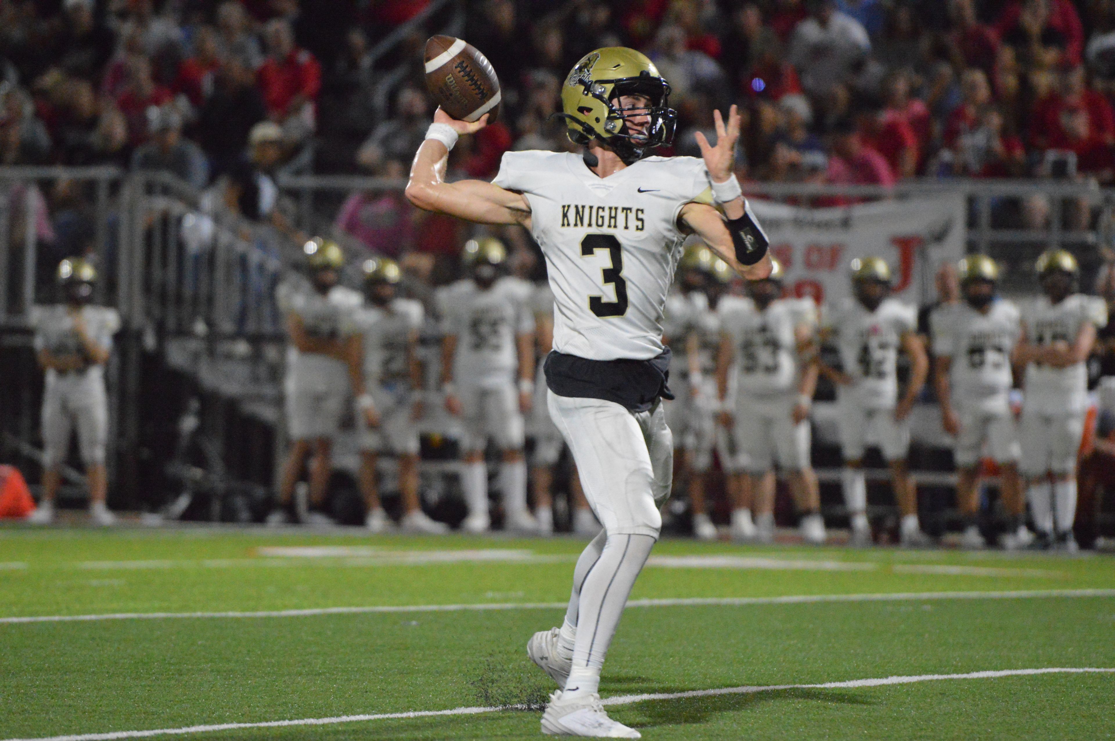 Farmington quarterback Brett Drye throws a pass downfield against Jackson on Friday, Sept. 20.