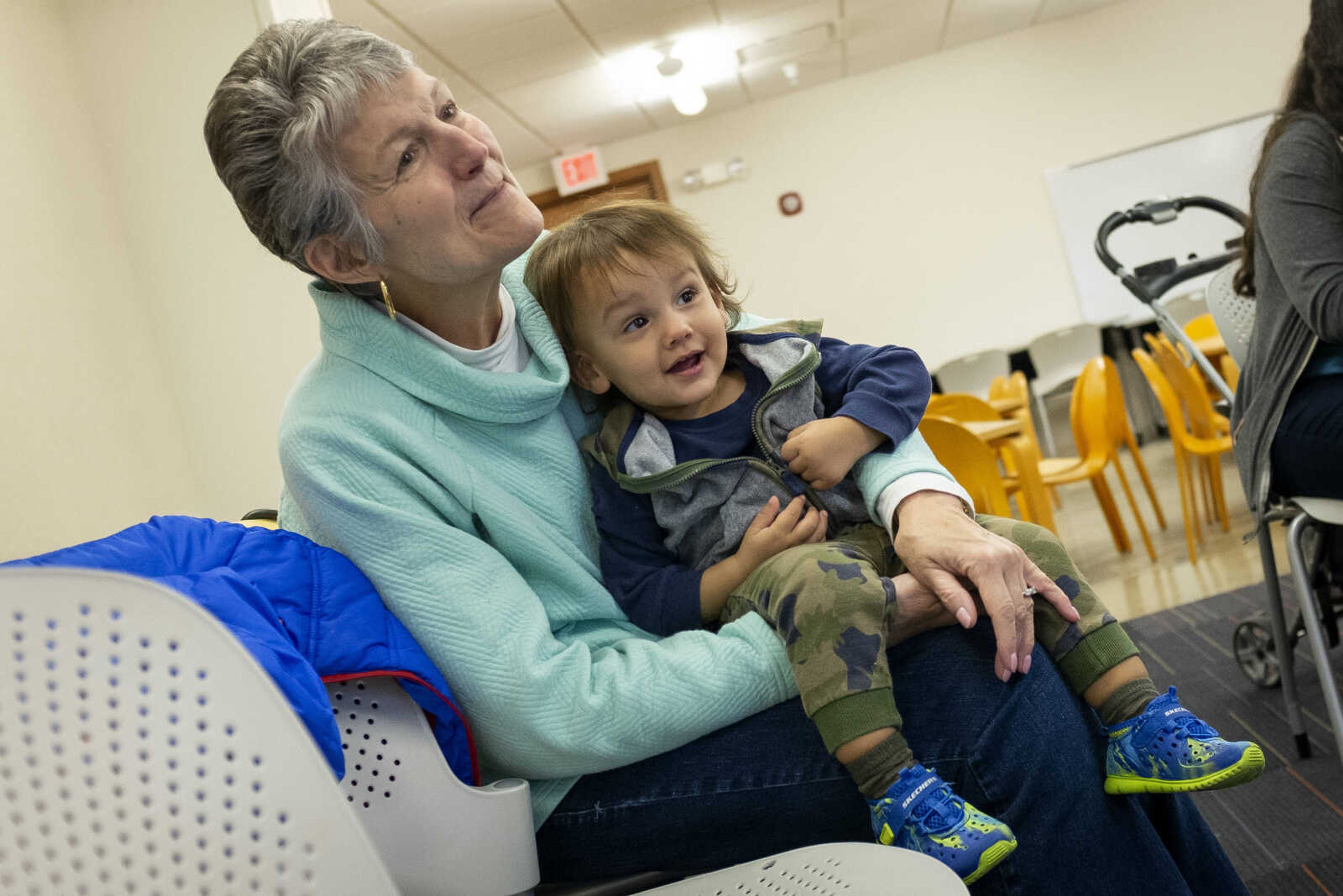 Chadene Krome, of Anchorage, Alaska, and temporarily living in Cape Girardeau, and her grandson James Krome-Guerrero, 16 months, of Cape Girardeau, take part in a "BabyBook" event Wednesday, Feb. 19, 2020, at the Cape Girardeau Public Library.&nbsp;