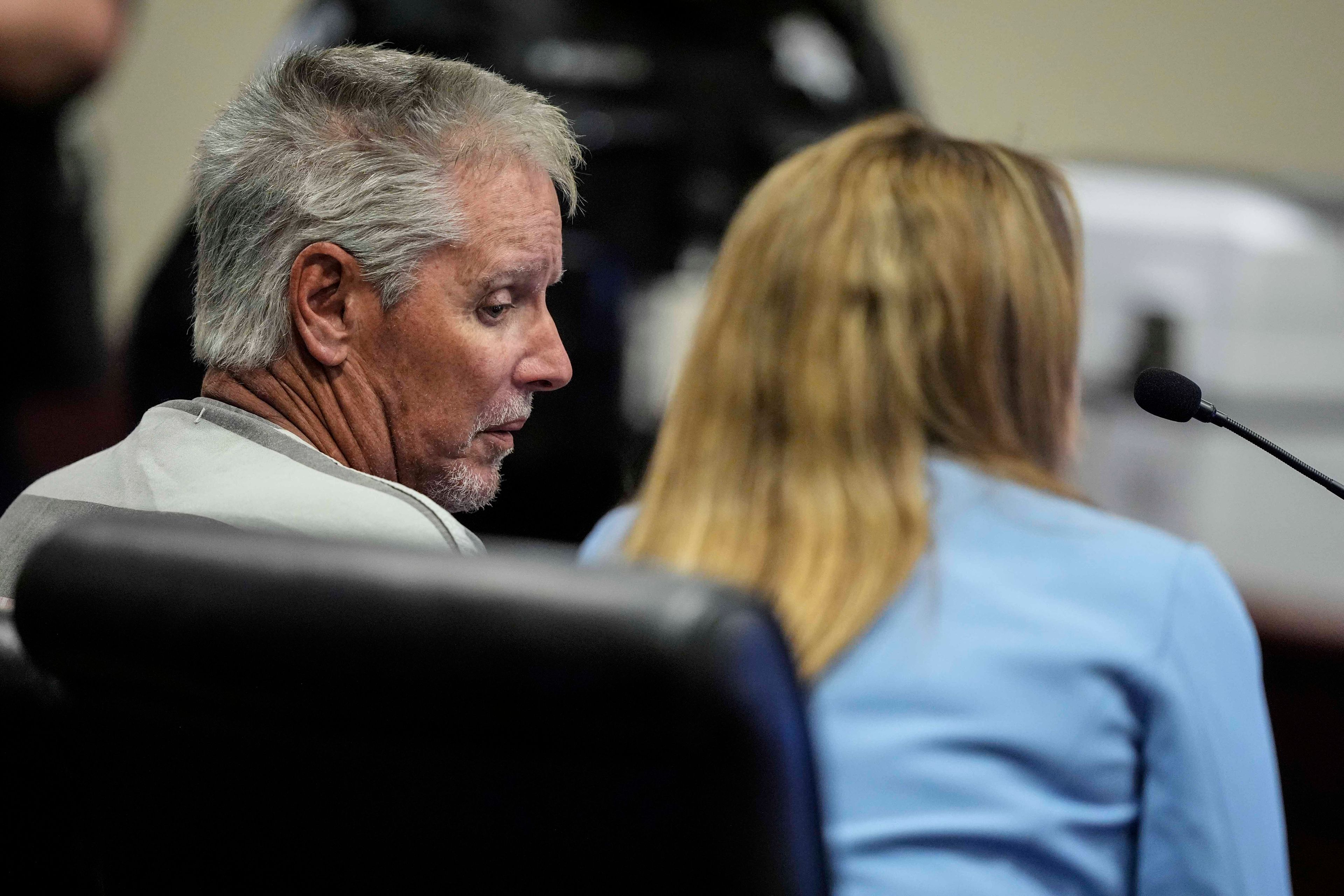 Colin Gray, 54, the father of Apalachee High School shooter Colt Gray, 14, sits in the Barrow County courthouse for his first appearance, on Friday, Sept. 6, 2024, in Winder, Ga. (AP Photo/Brynn Anderson)