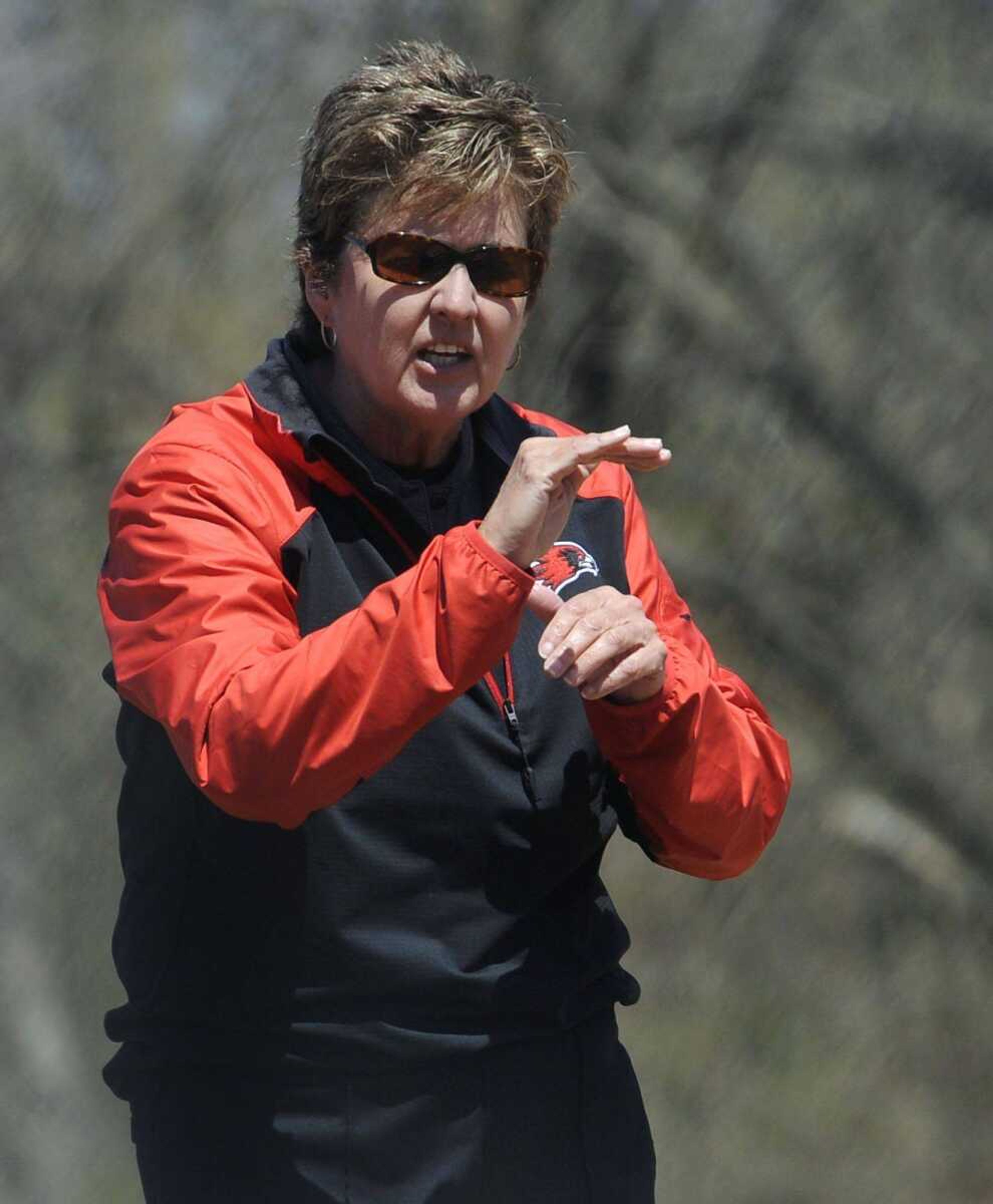 Southeast Missouri State coach Lana Richmond signals in the first game with Tennessee State Sunday, April 6, 2014 at the Southeast Softball Complex. (Fred Lynch)