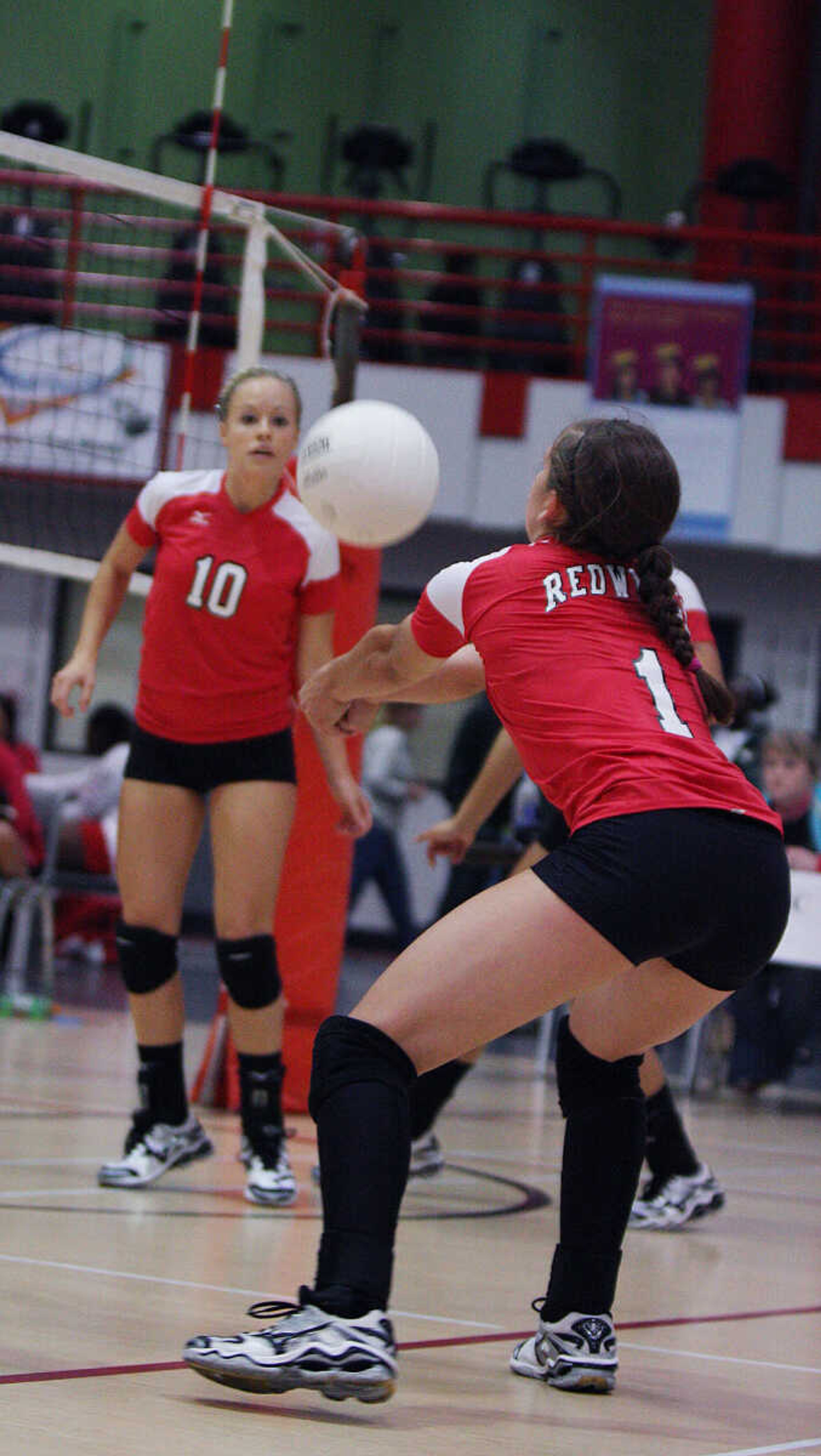 Eminence's Kelsey Williams passes the ball up for teammates in their game against Jackson.