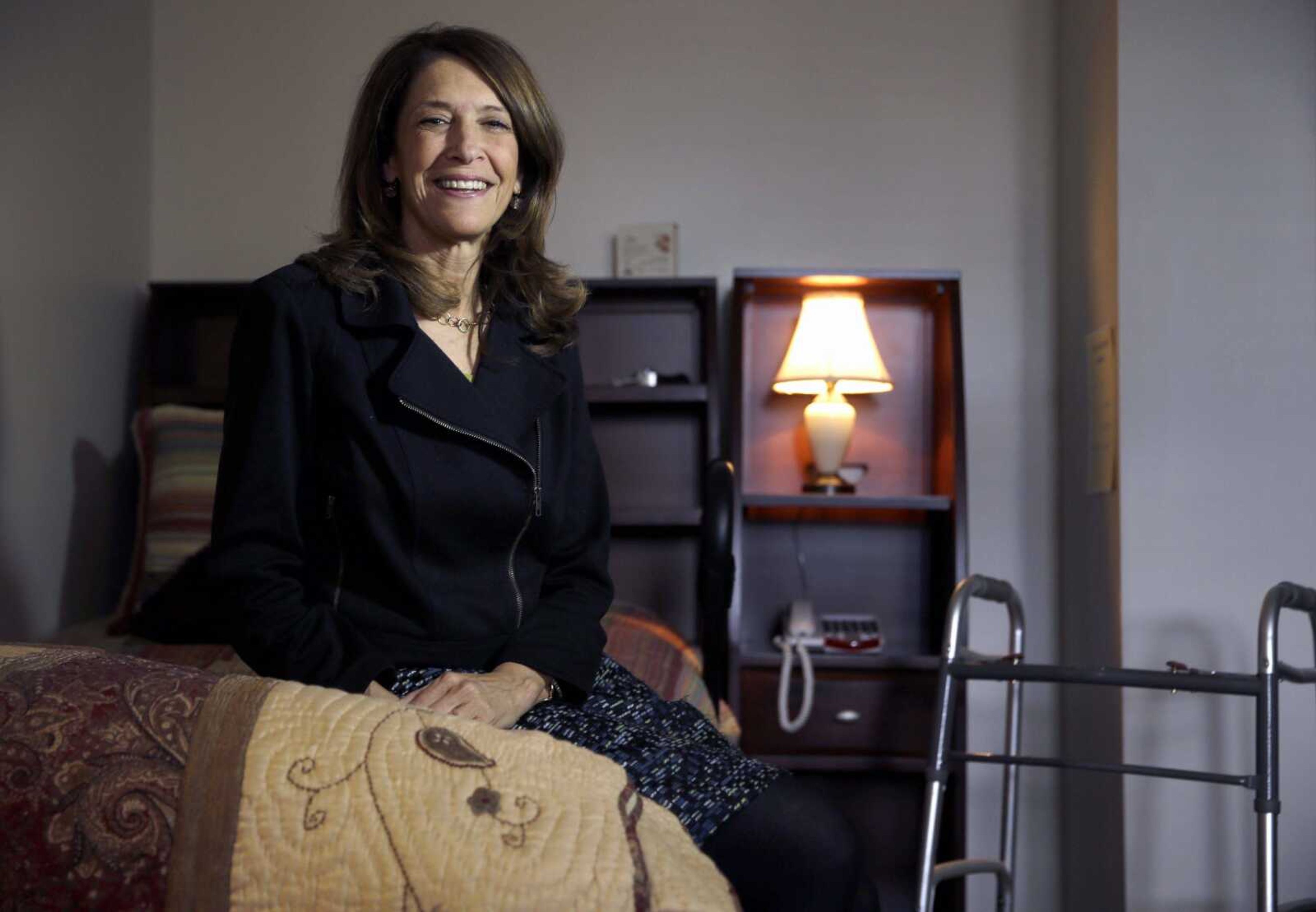 Lisa Baron, founder of Memory Care Home Solutions, poses for a photo Friday in her office in St. Louis. The not-for-profit is working to help Alzheimer's sufferers stay in their homes longer, and Baron said her program is a model that should be emulated nationwide.