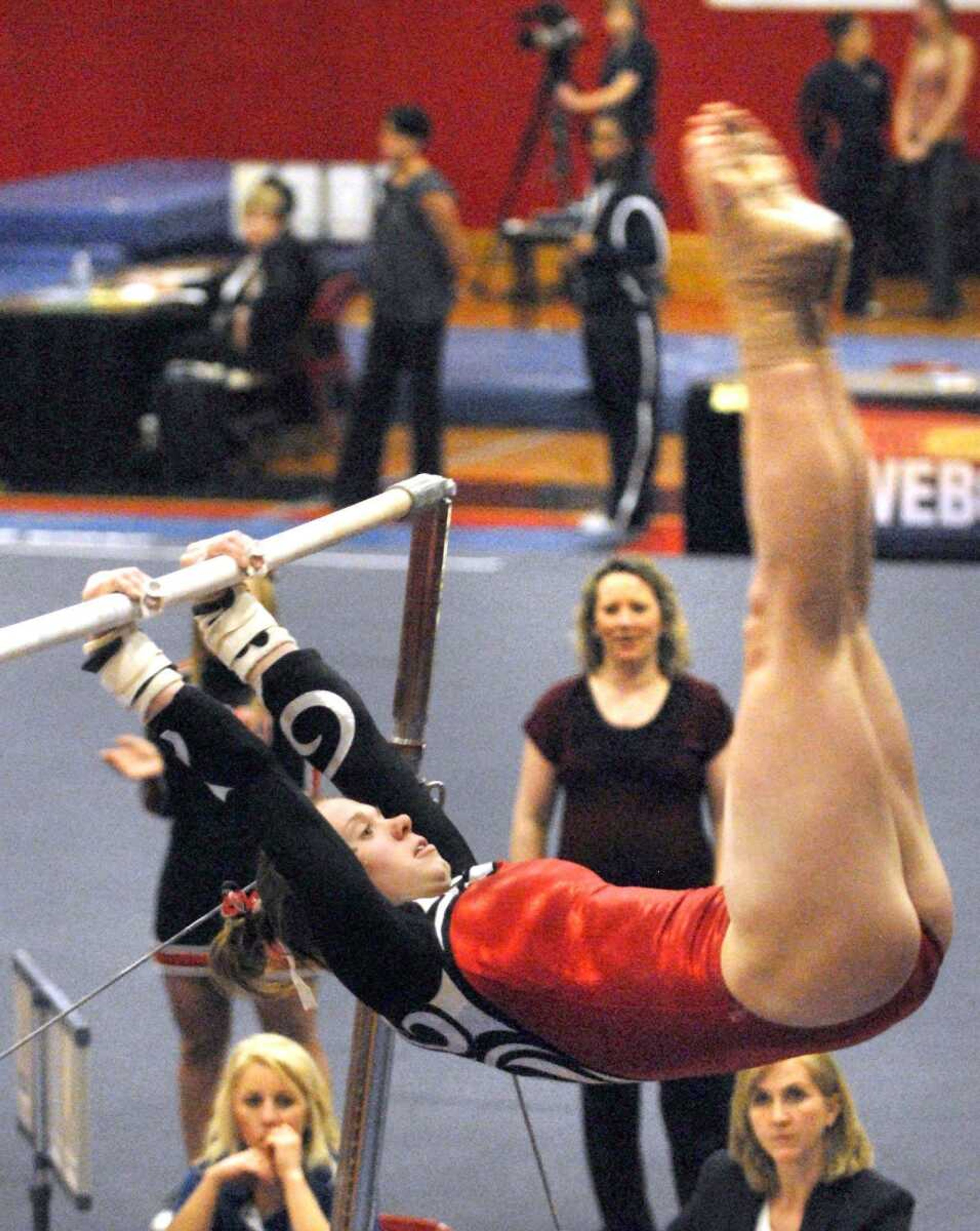 Southeast Missouri State's Megan Fosnow competes on the uneven bars Friday at Houck Field House. (Laura Simon)