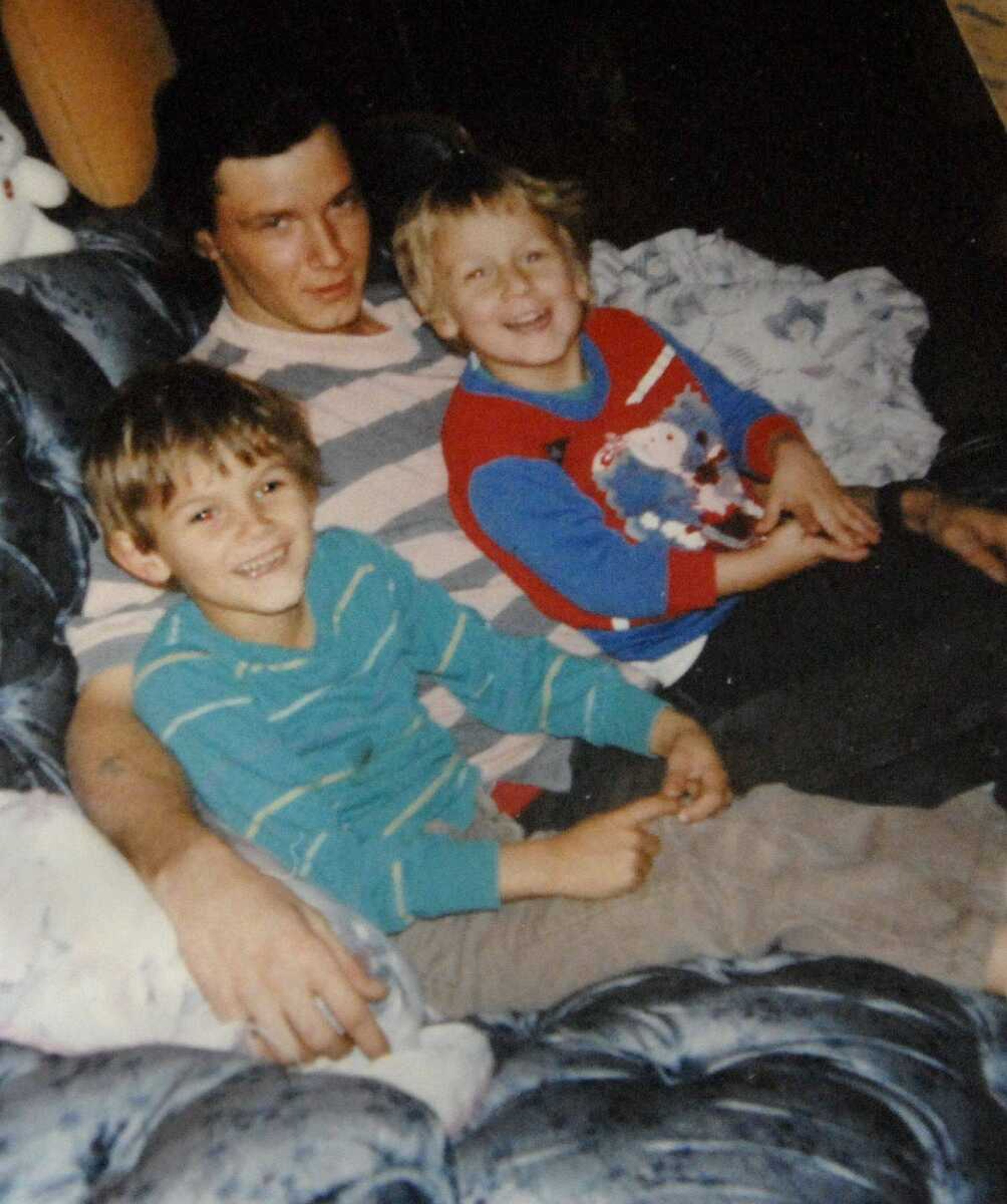 Michael Sanders with his sons John Michael, left, and Zach.