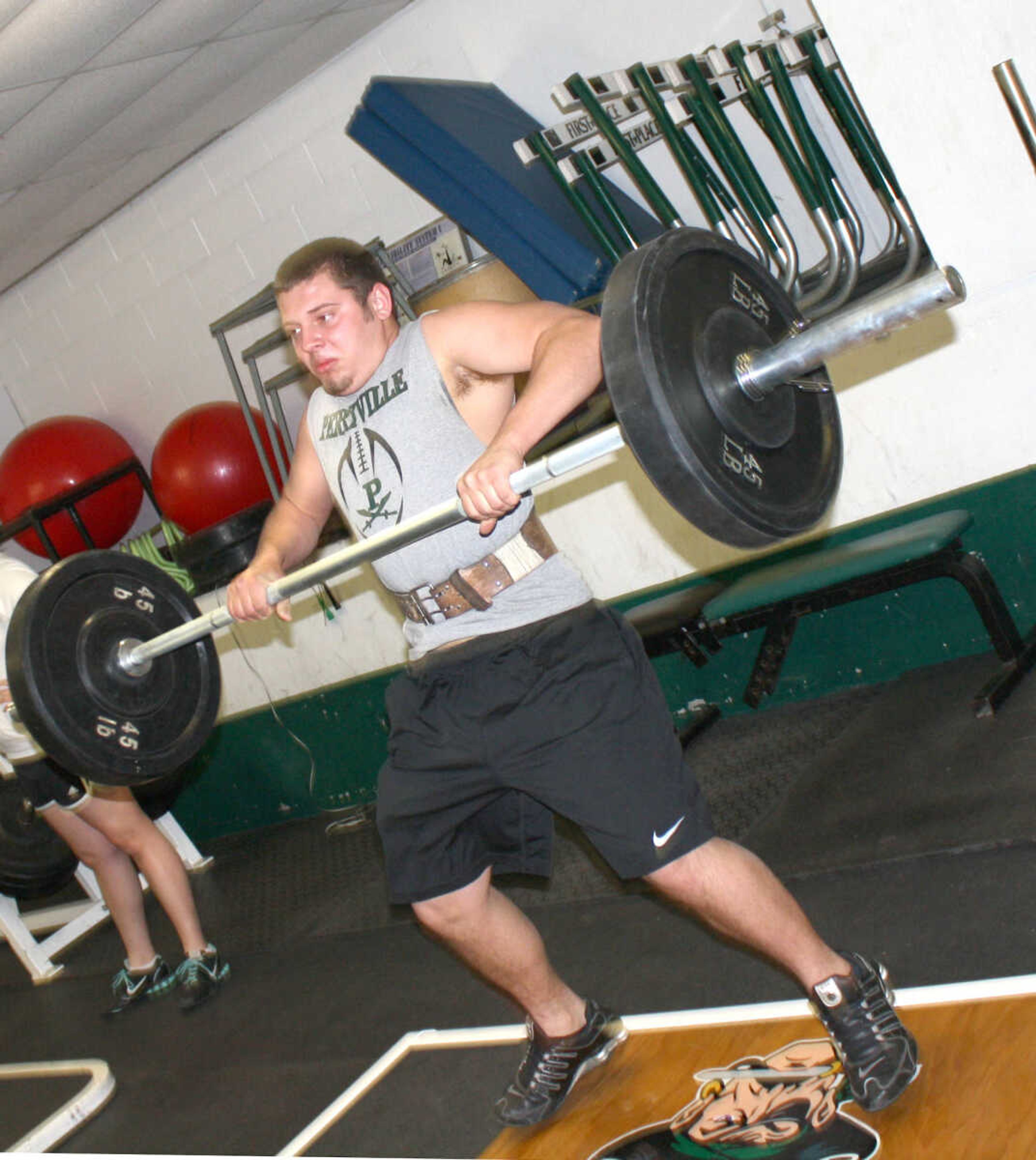 Robby Brewer lifts weights in the updated weight room at Perry County School District 32. Pirate Athletic Club donated $10,000 for improvements and new equipment. PAC will be recognized for their contribution during a ribbon cutting ceremony March 19 at Perryville High School.