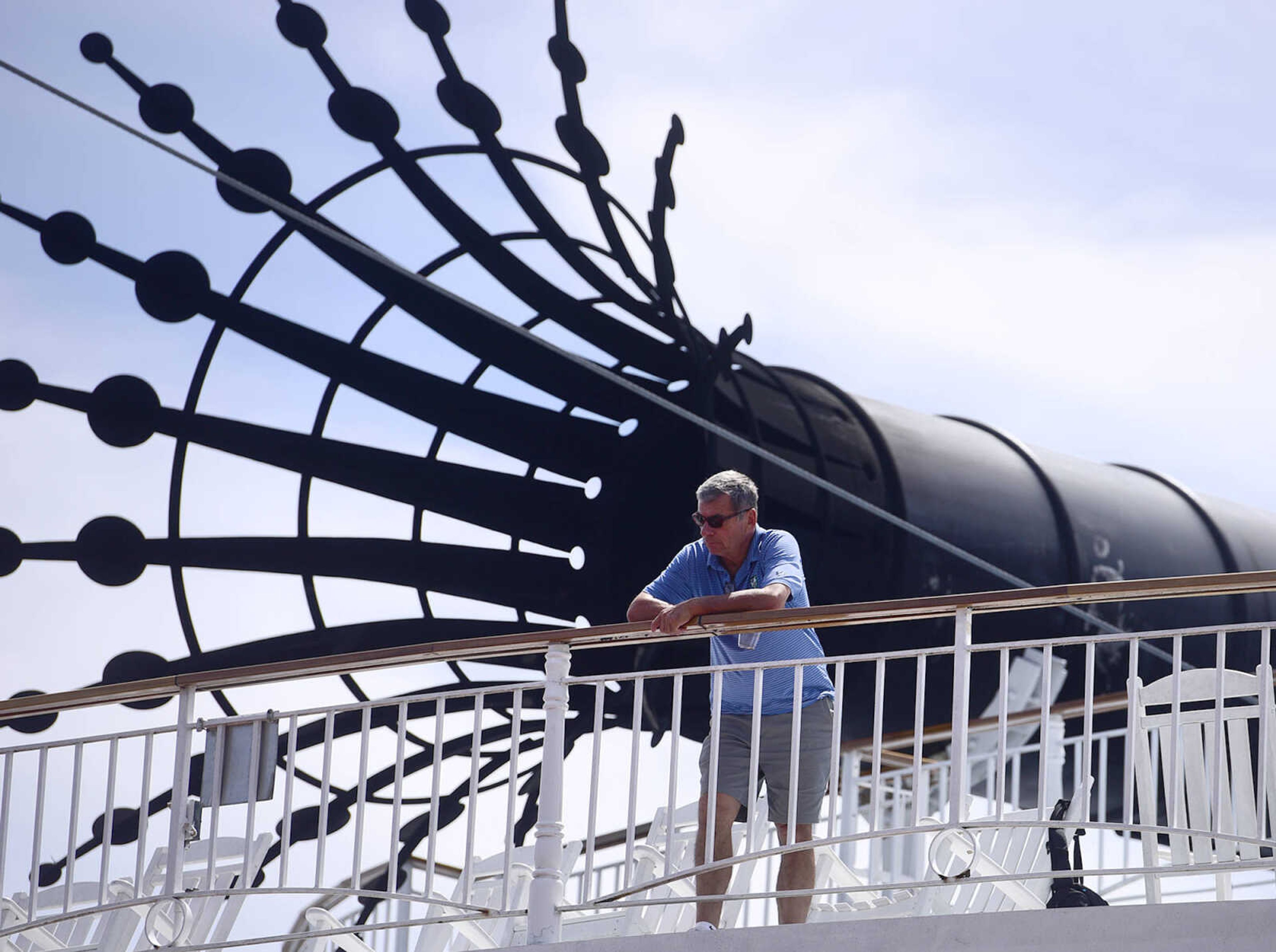 Passengers on the American Queen take in the from the deck as the riverboat prepares to depart Riverfront Park on Wednesday, Aug. 23, 2017, in downtown Cape Girardeau.