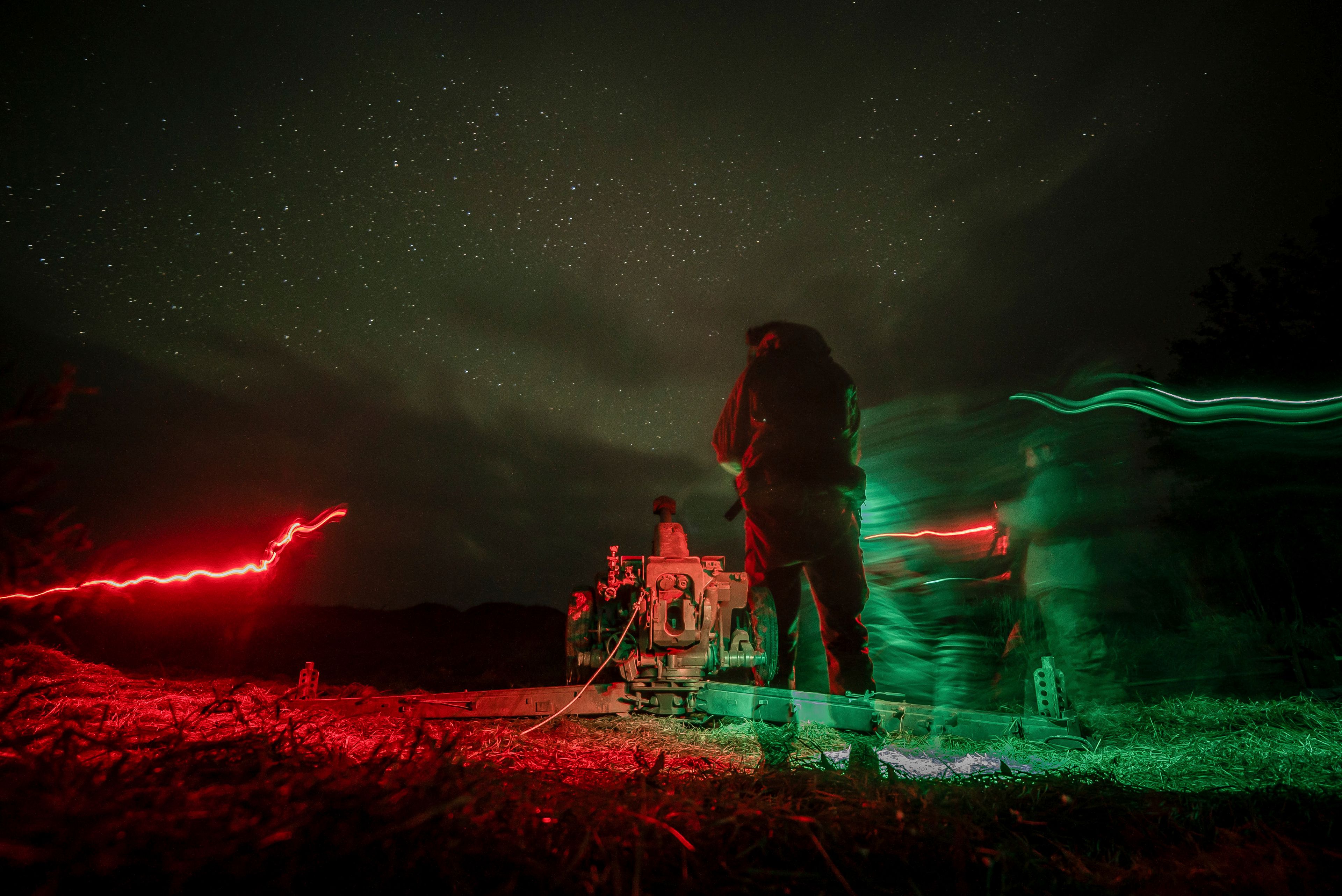 Ukrainian servicemen prepare 122mm artillery cannon before firing towards Russian positions in Kherson region, Ukraine, Sunday Oct. 27, 2024. (AP Photo/Marko Ivkov)