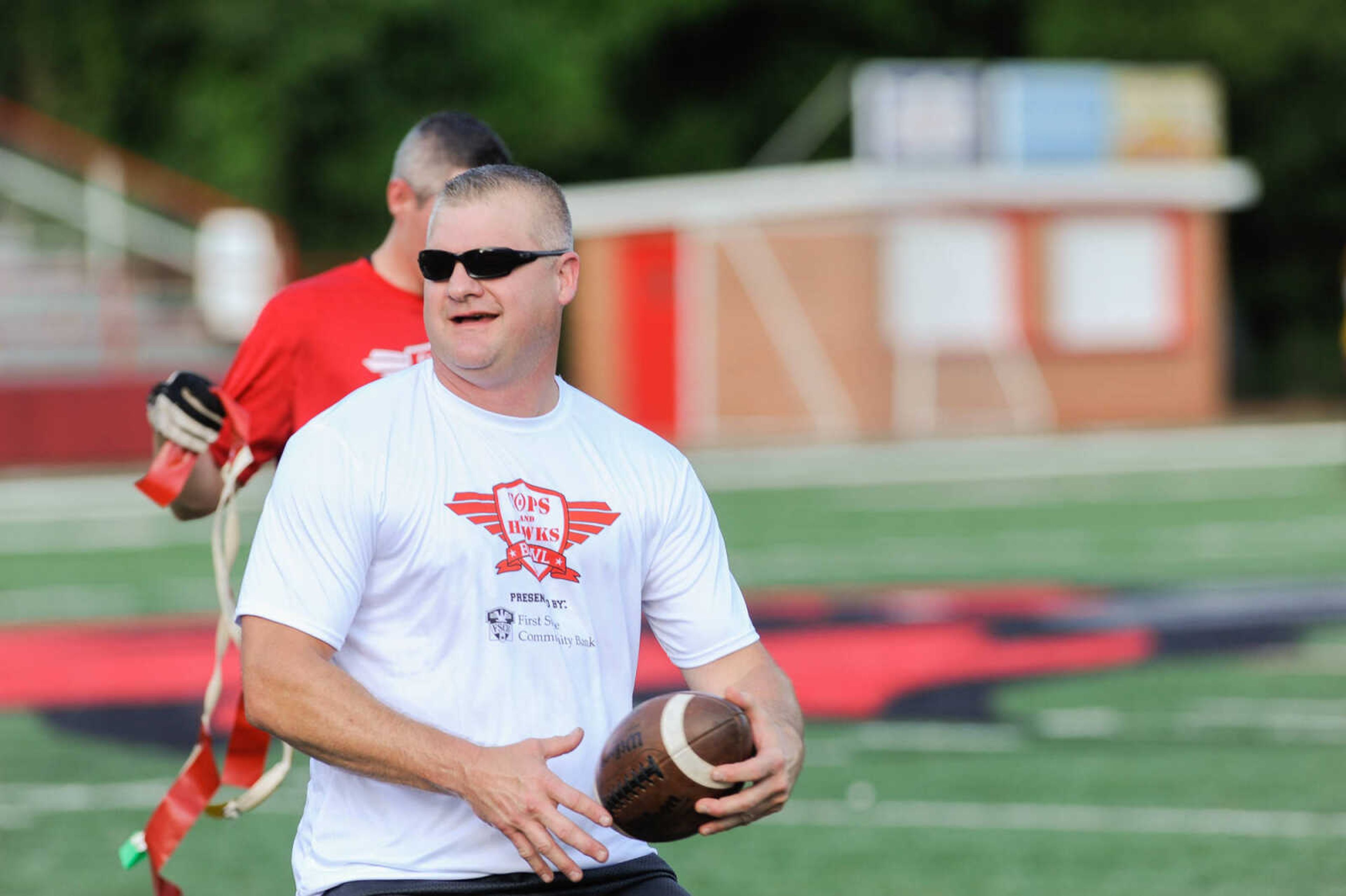 GLENN LANDBERG ~ glandberg@semissourian.com

The Cops and Hawks Bowl Thursday, July 21, 2016 at Houck Stadium. The flag-football game was a fundraiser for the family members of those who have lost their lives in the line of duty.