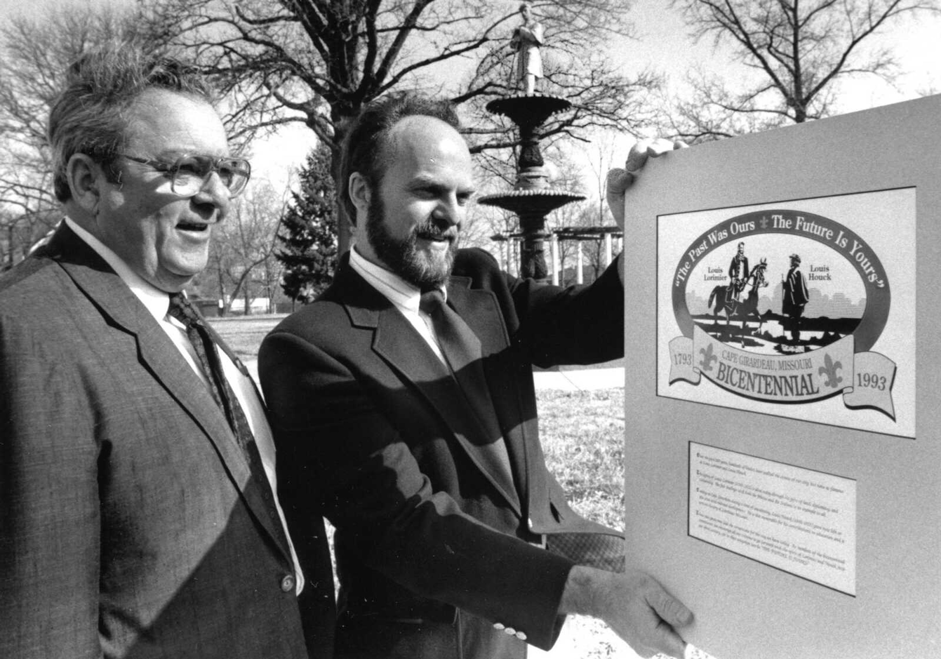 Published Feb. 10, 1992.
Cape Girardeau Mayor Gene Rhodes, left, and Gary Bunting looked at the seal and motto that Bunting designed for Cape Girardeau's bicentennial celebration. Special events were planned marking the founding of the trading post in 1793 that led to the establishment of the city. (Fred Lynch ~ Southeast Missourian archive)