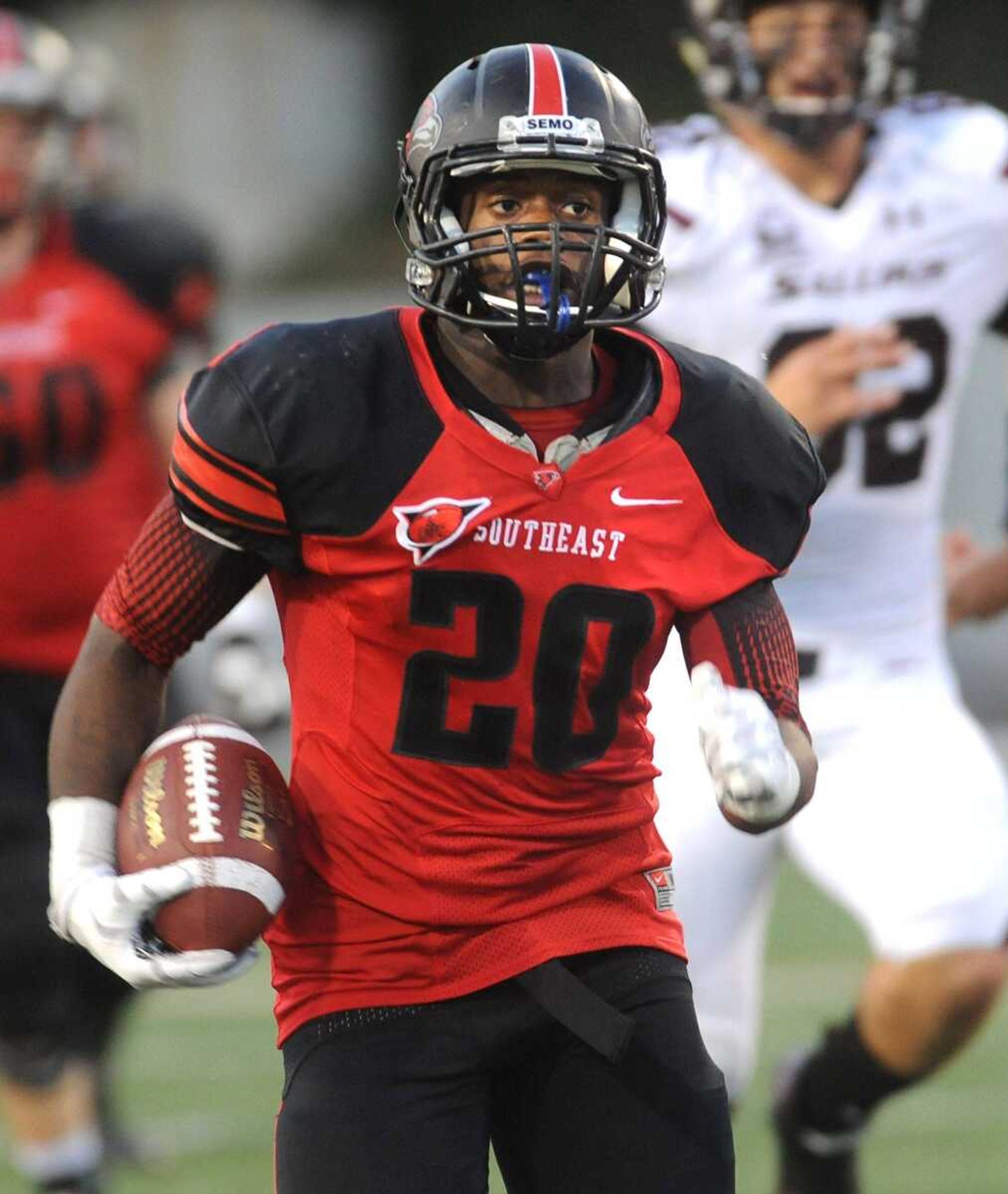 Southeast Missouri State's DeMichael Jackson carries against Southern Illinois during the home opener. Jackson tore an ACL on Saturday and will miss the remainder of the season. (Fred Lynch)