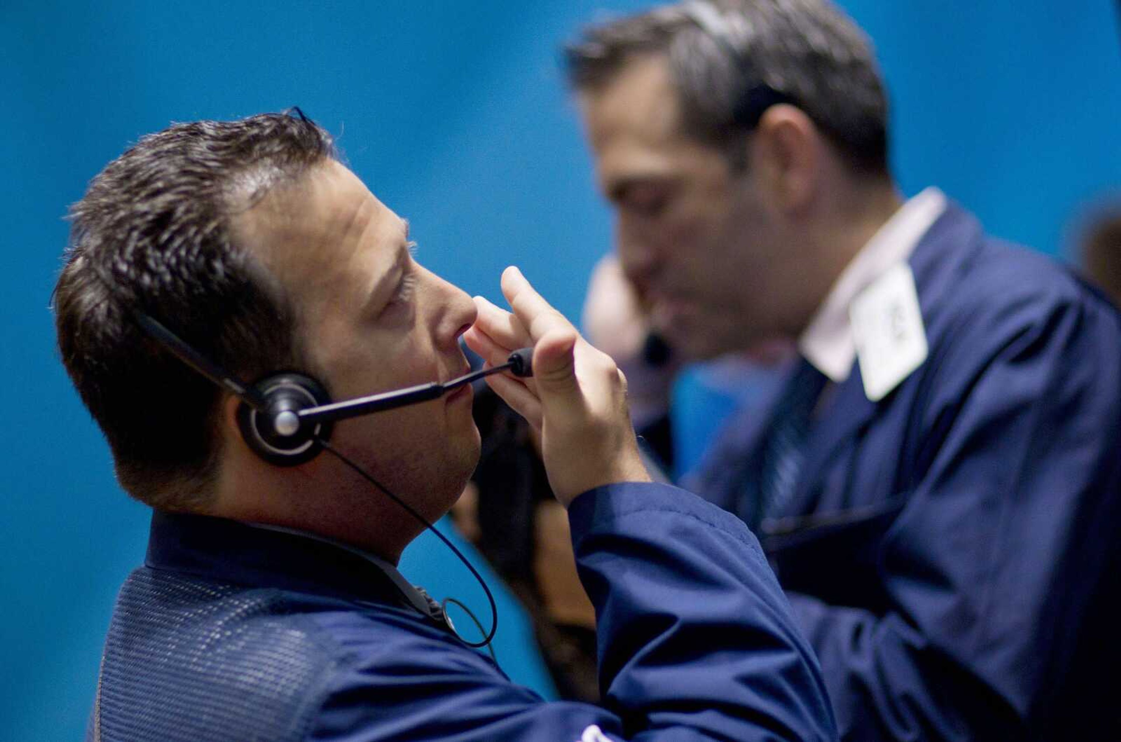 Traders work on the floor of the New York Stock Exchange on Thursday. (Jin Lee ~ Associated Press)