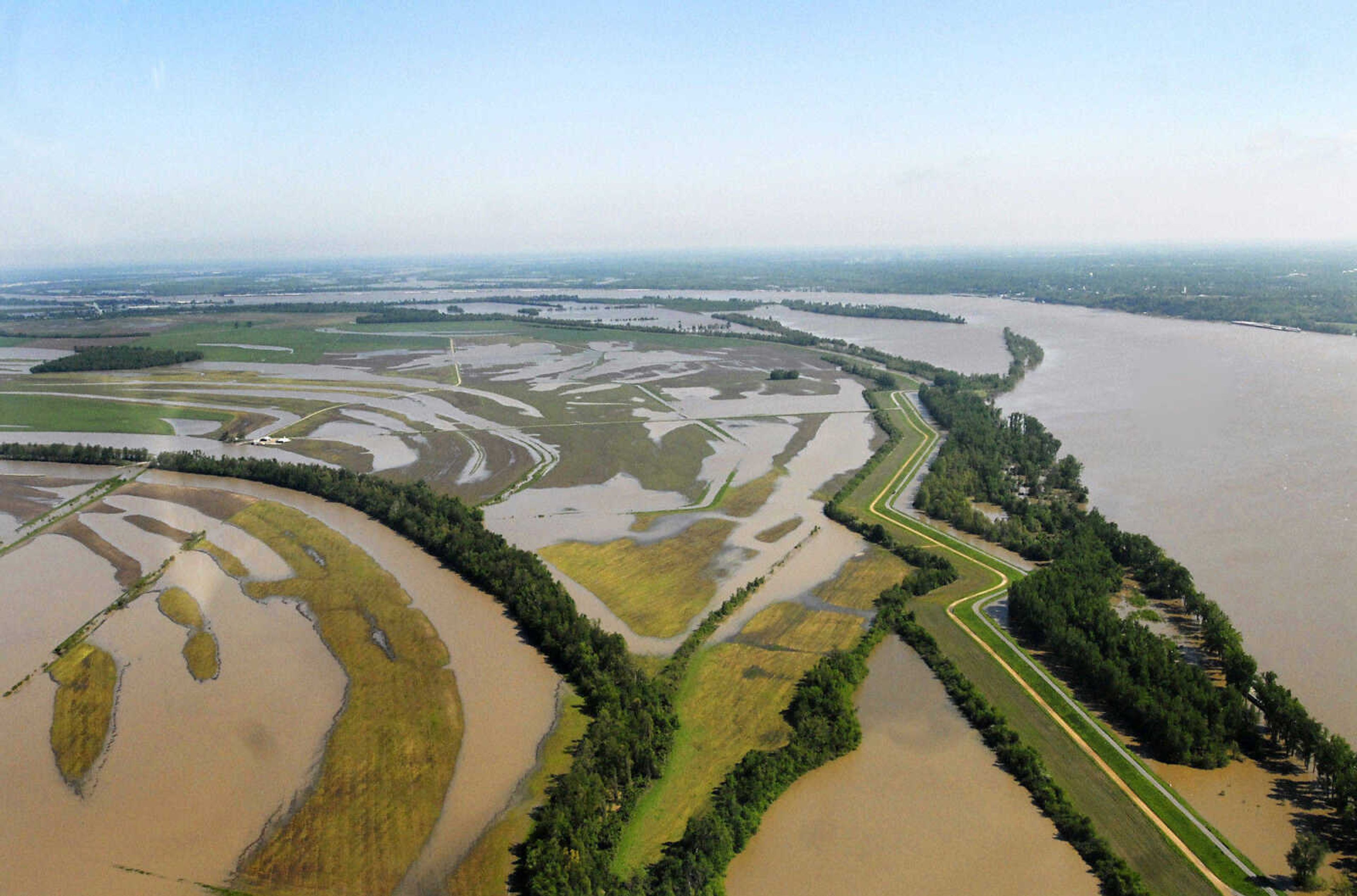 KRISTIN EBERTS ~ keberts@semissourian.com

Birds Point levee runs along the Mississippi River outside of Wyatt, Mo., on Thursday, April 28, 2011. A levee breach would flood over 100,000 acres of farmland in Southeast Missouri.