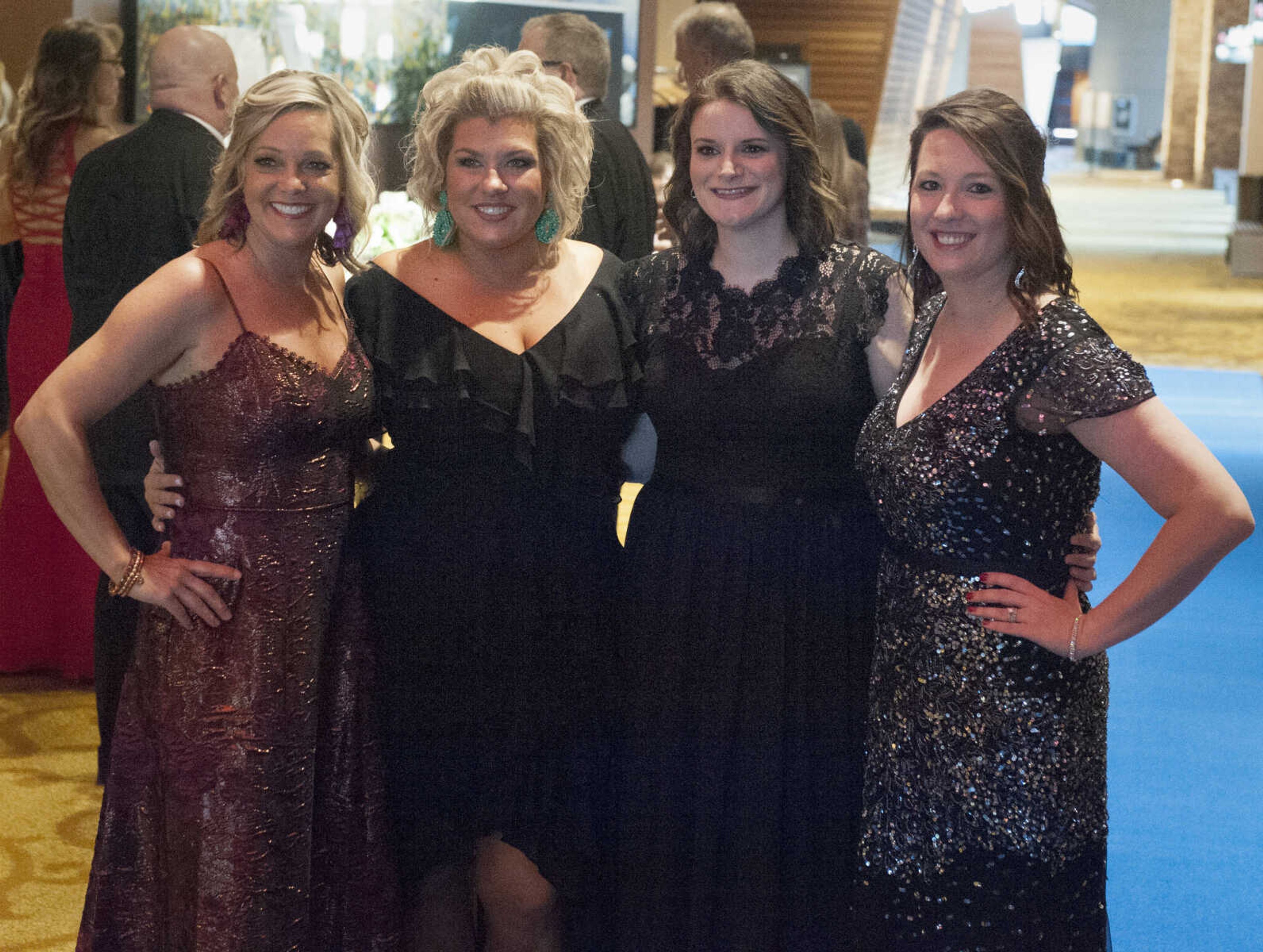 From left, Kimberly Likens, Heather Short, Laura Propst and Danielle Torbet pose for a photo before The Friends Gala, to benefit Saint Francis Healthcare System's CancerCare and CardiacCare patient funds, on Saturday at Isle Casino Cape Girardeau.