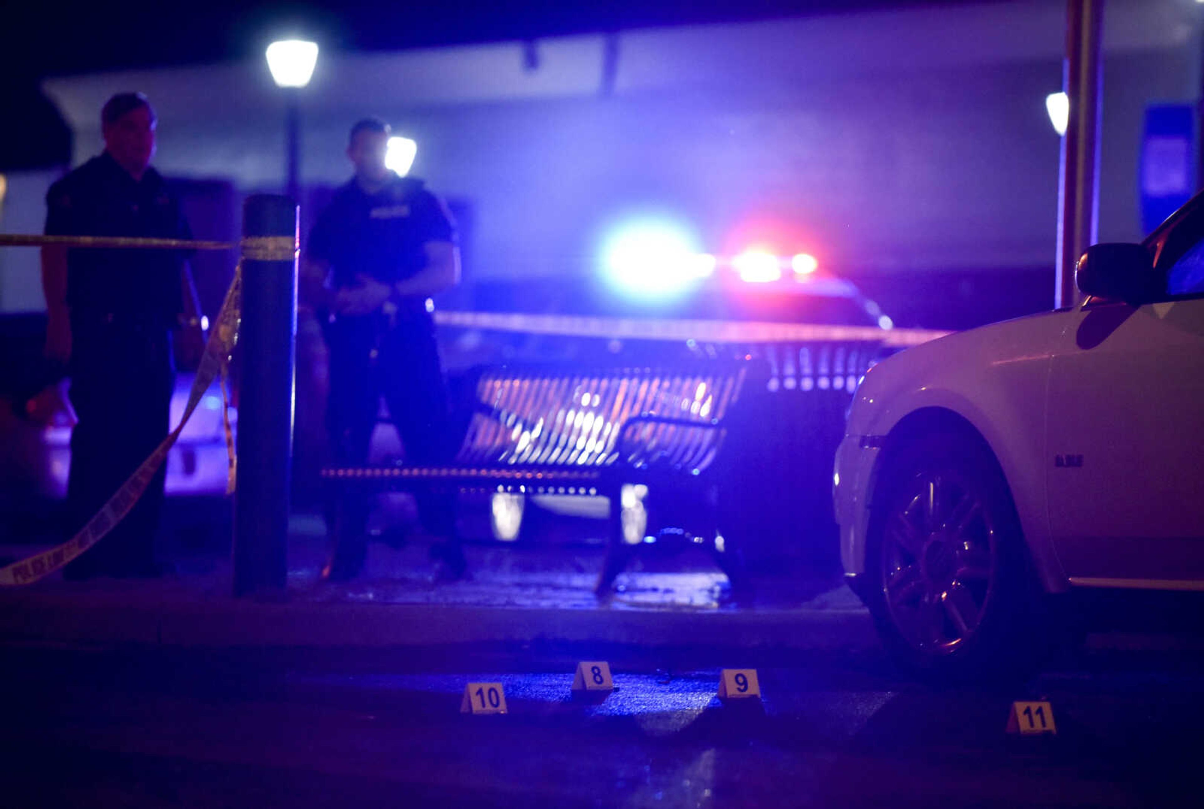 Officers with the Cape Girardeau Police Department investigate the scene of a shooting early Sunday, June 2, 2018 at the intersection of Independence and Main Street in Cape Girardeau.