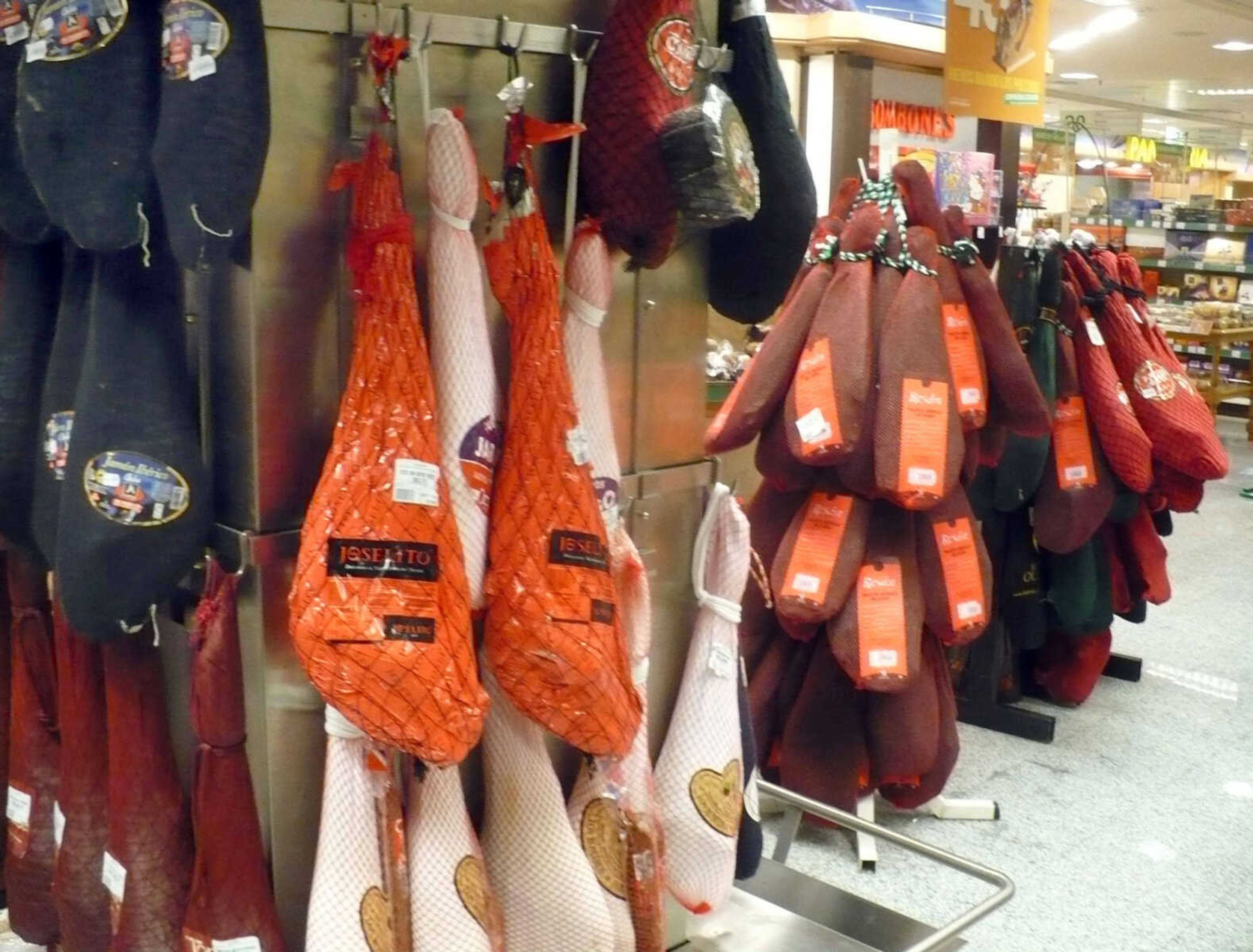 TOM HARTE ~ photos@semissourian.com
Spanish hams with a street value of $20,000-$30,000 hang on display at a Spanish gourmet grocery store.