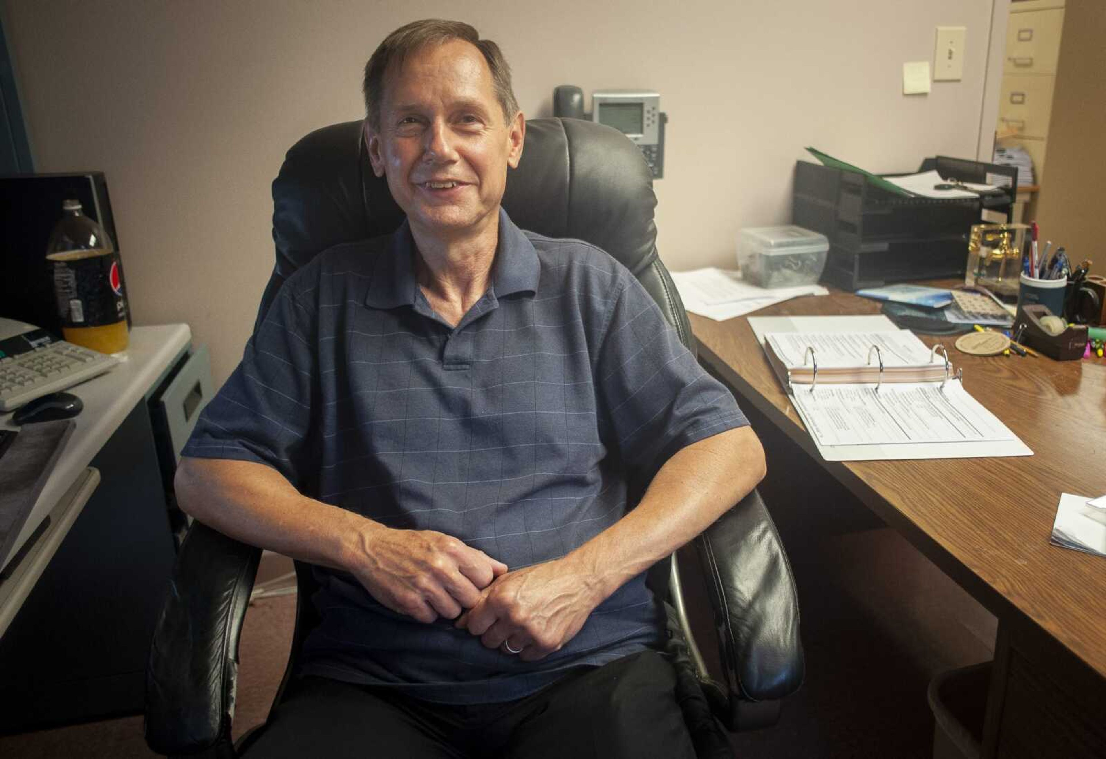 City of Cape Girardeau finance director John Richbourg poses for a portrait Tuesday in his office at Cape Girardeau City Hall. Richbourg is retiring as a full-time city employee Friday after 31-and-a-half years of full-time work with Cape Girardeau.