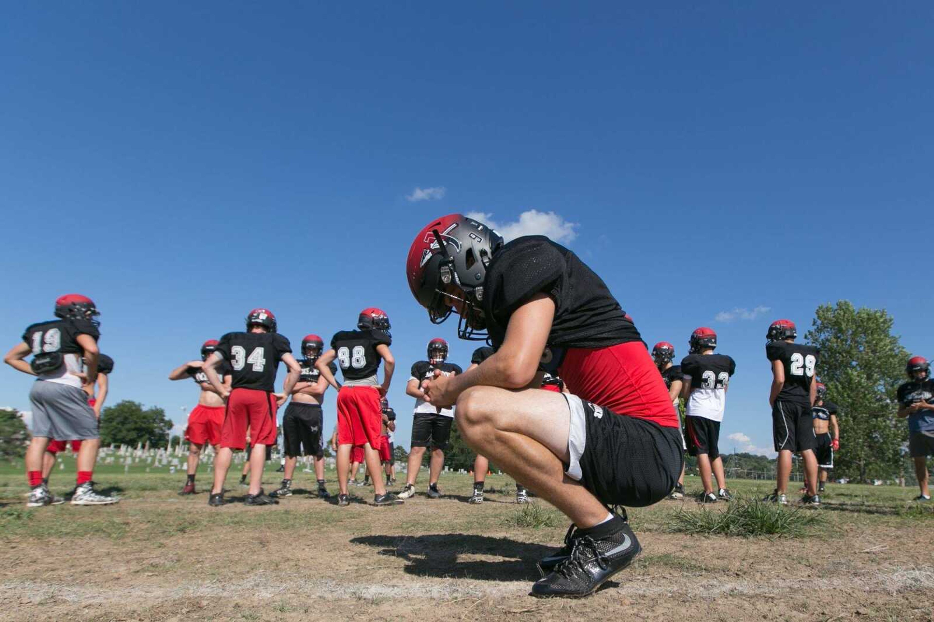 Jackson's Jeremy Elliott takes a break between plays during practice Tuesday, Aug. 11, 2015 at Jackson High School. (Glenn Landberg)