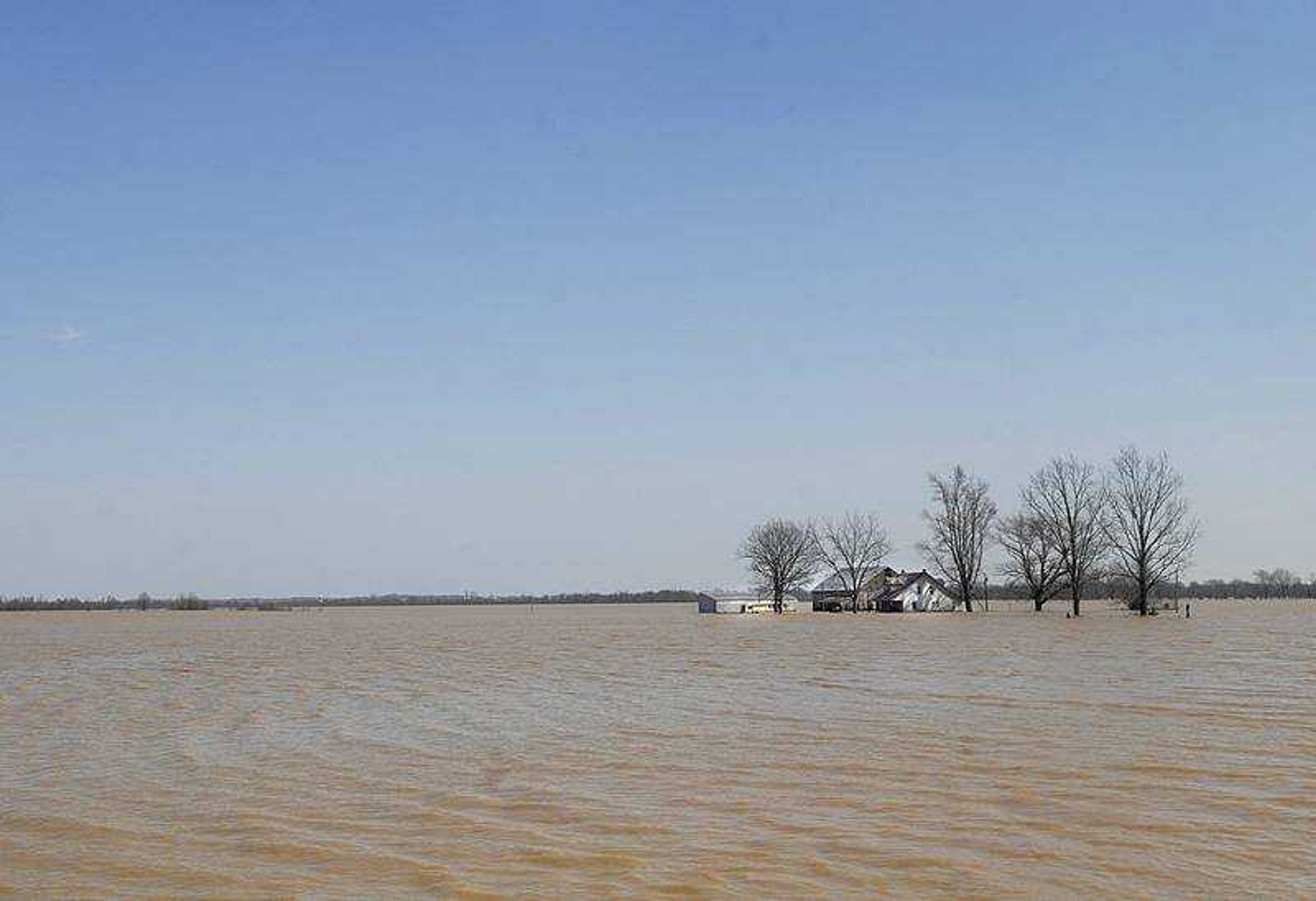 AARON EISENHAUER ~ aeisenhauer@semissourian.com
A home is completely surrounded by water in the low land at Dutchtown on Thursday, March 20, 2008.