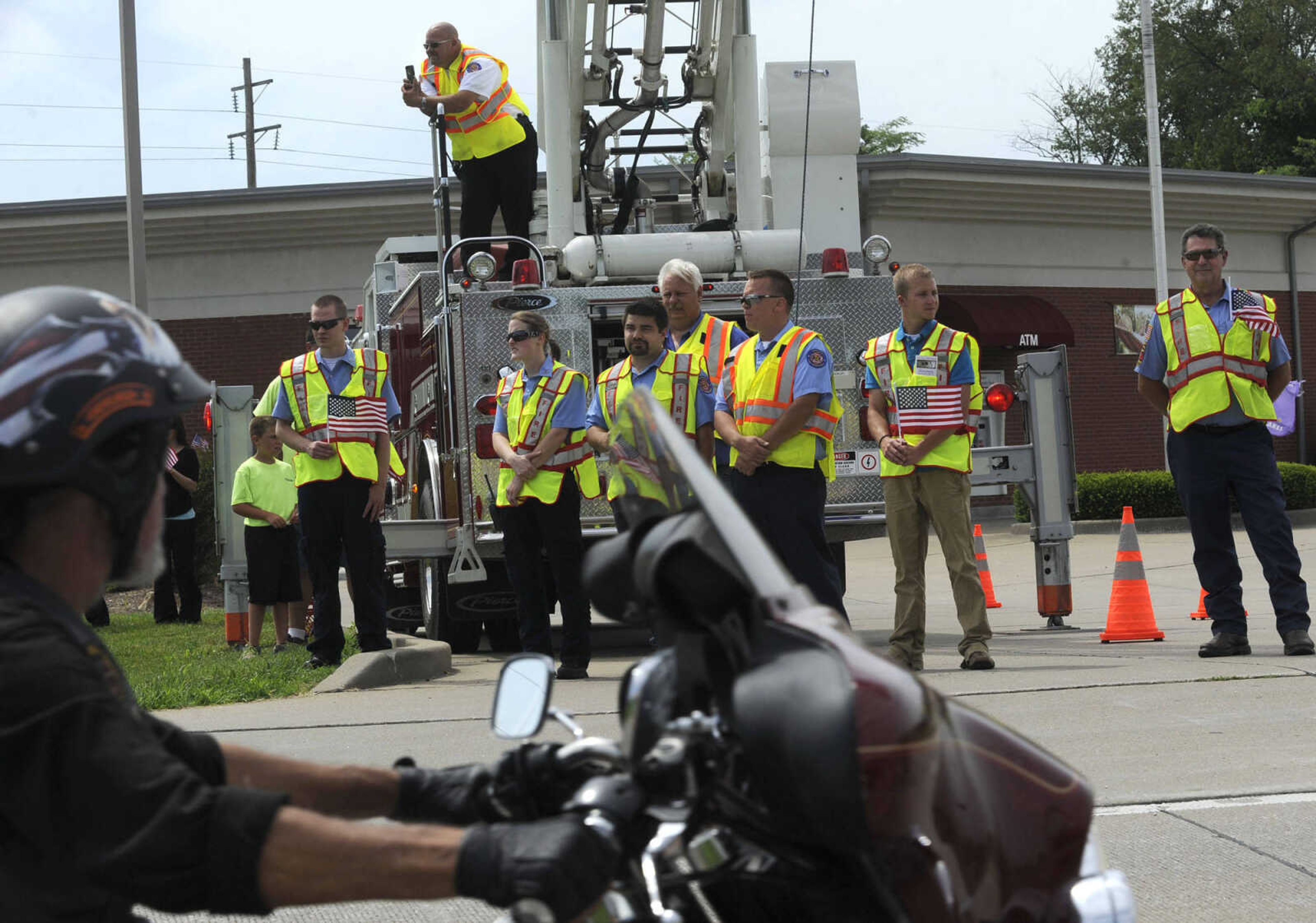 Perryville firefighters welcome The Wall That Heals Tuesday, June 17, 2014 in Perryville, Mo.