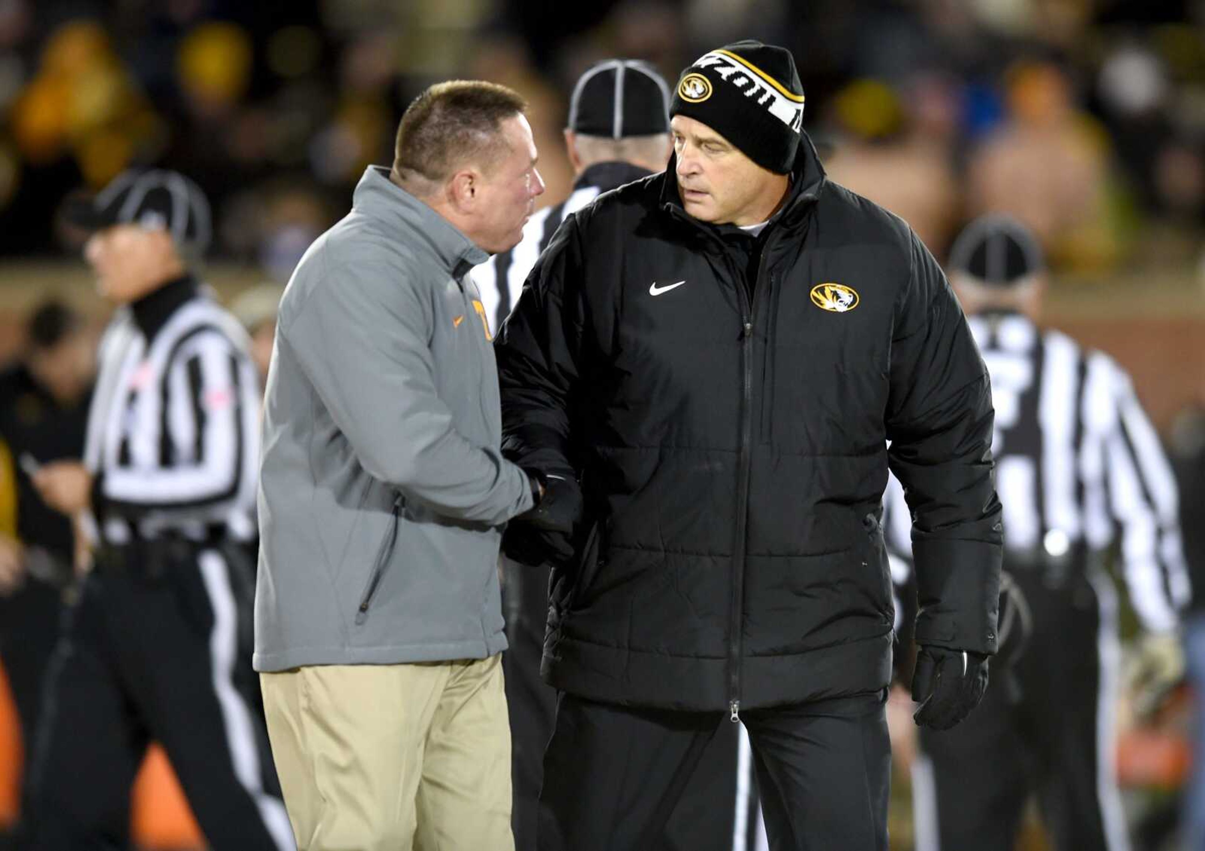 Tennessee coach Butch Jones talks with Missouri coach Gary Pinkel, right, before Saturday's game in Columbia, Missouri. Tennessee won 19-8. (Amy Smotherman Burgess ~ Knoxville News Sentinel)