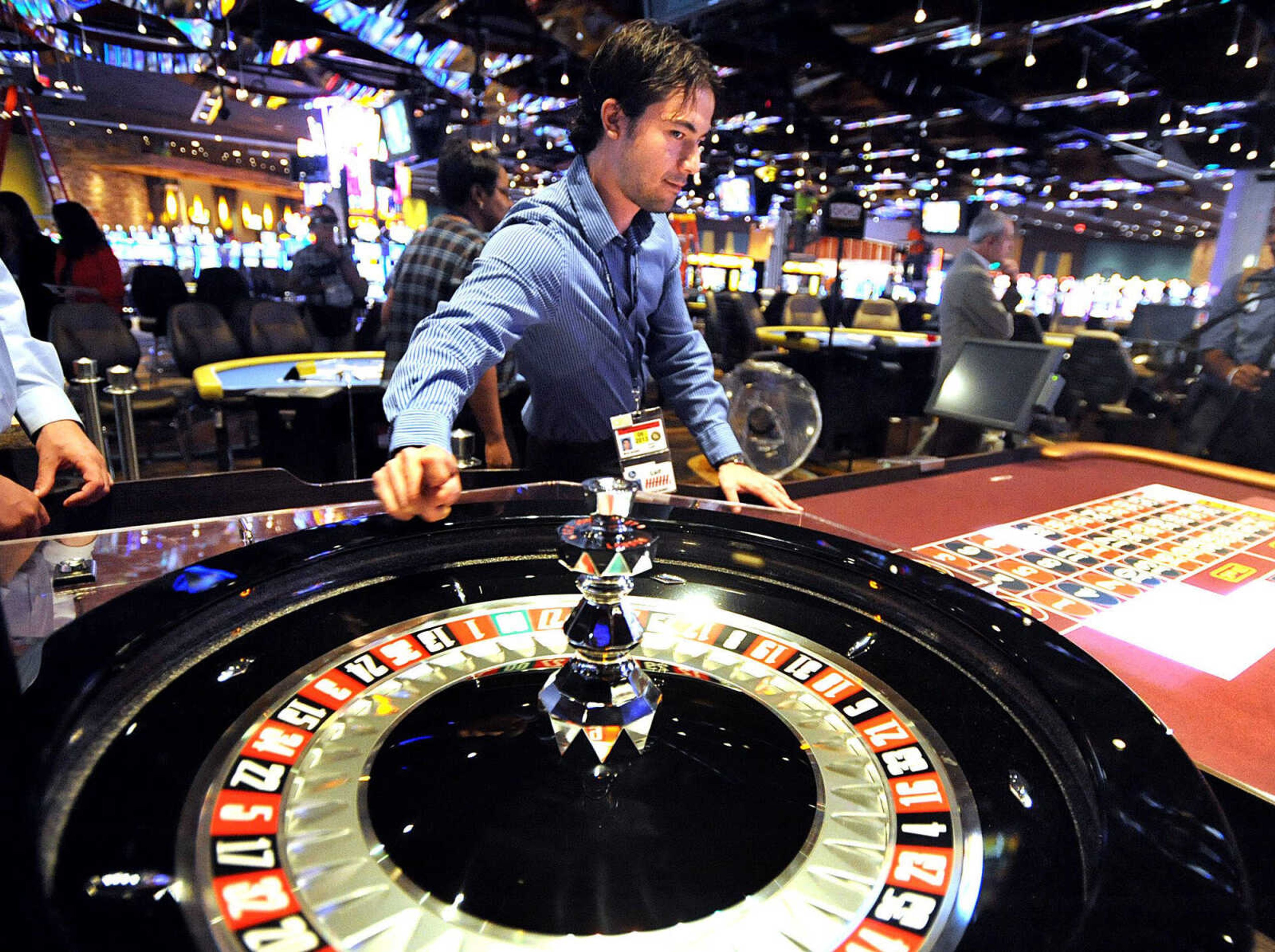 Leif Nelson spins the wheel at the roulette table on the gaming floor of the Isle of Capri in Cape Girardeau. (Laura Simon)