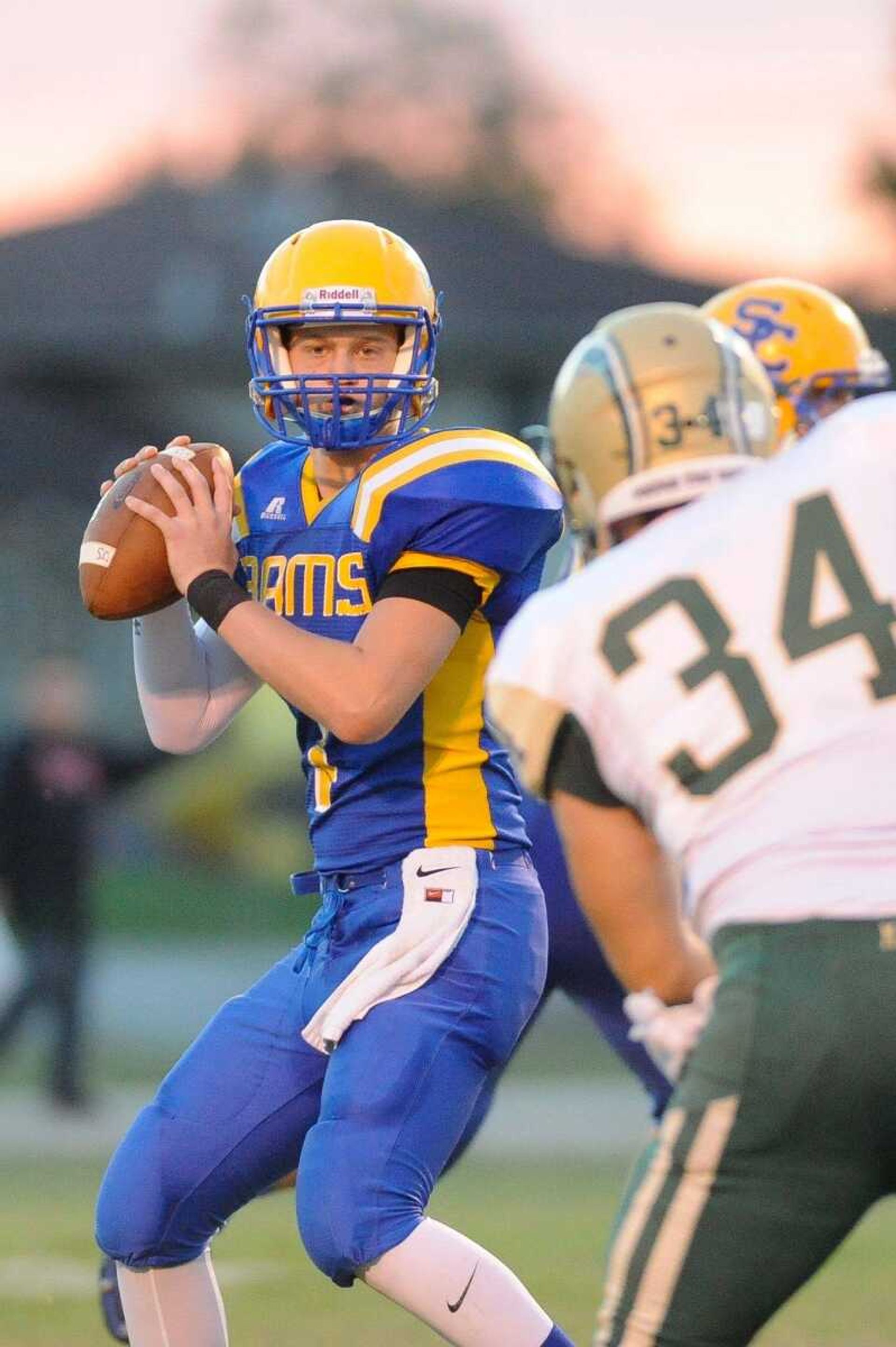 Scott City's Ty Wilthong looks for an open receiver during the first quarter against Malden Friday, Sept. 11, 2015 in Scott City. (Glenn Landberg)