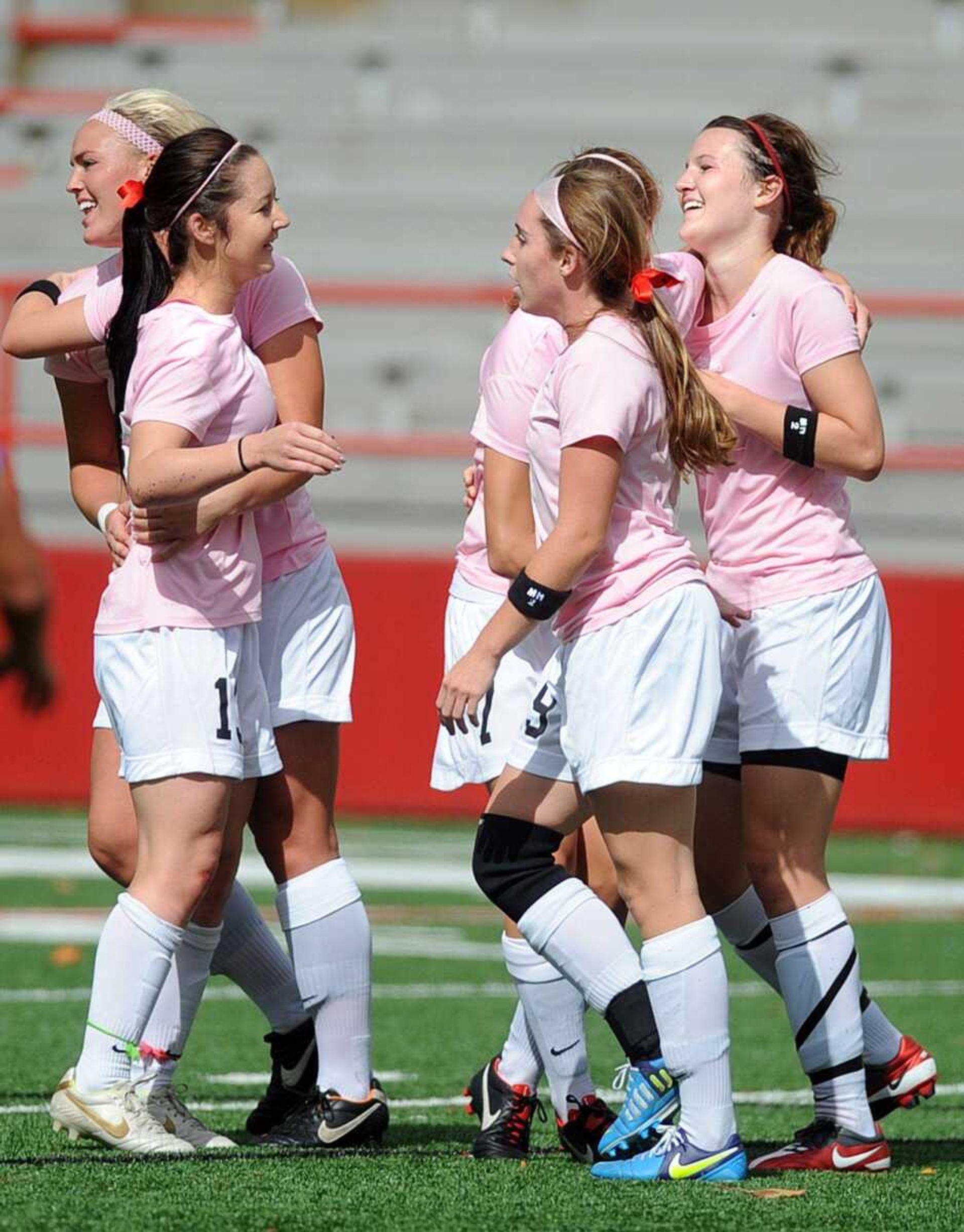 Southeast players celebrate a goal by Storm French, right, during the first half of Sunday's game against Morehead State at Houck Stadium. French's goal tied the score at 1-1.LAURA SIMON lsimon@semissourian.com