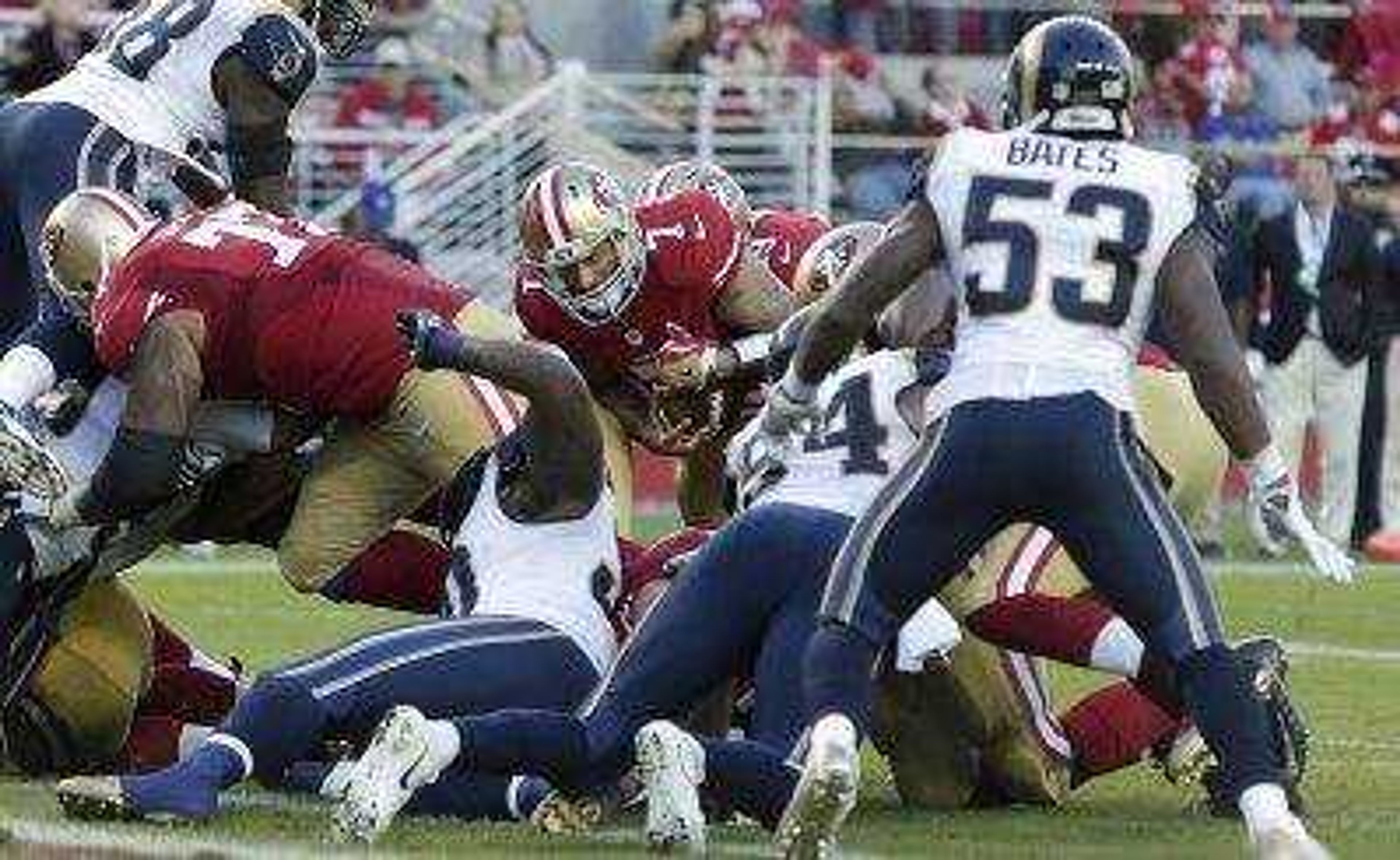 49ers quarterback Colin Kaepernick runs before losing a fumble against the Rams during the final seconds of SundayÂ’s game in Santa Clara, California. The Rams recovered the ball to win 13-10.