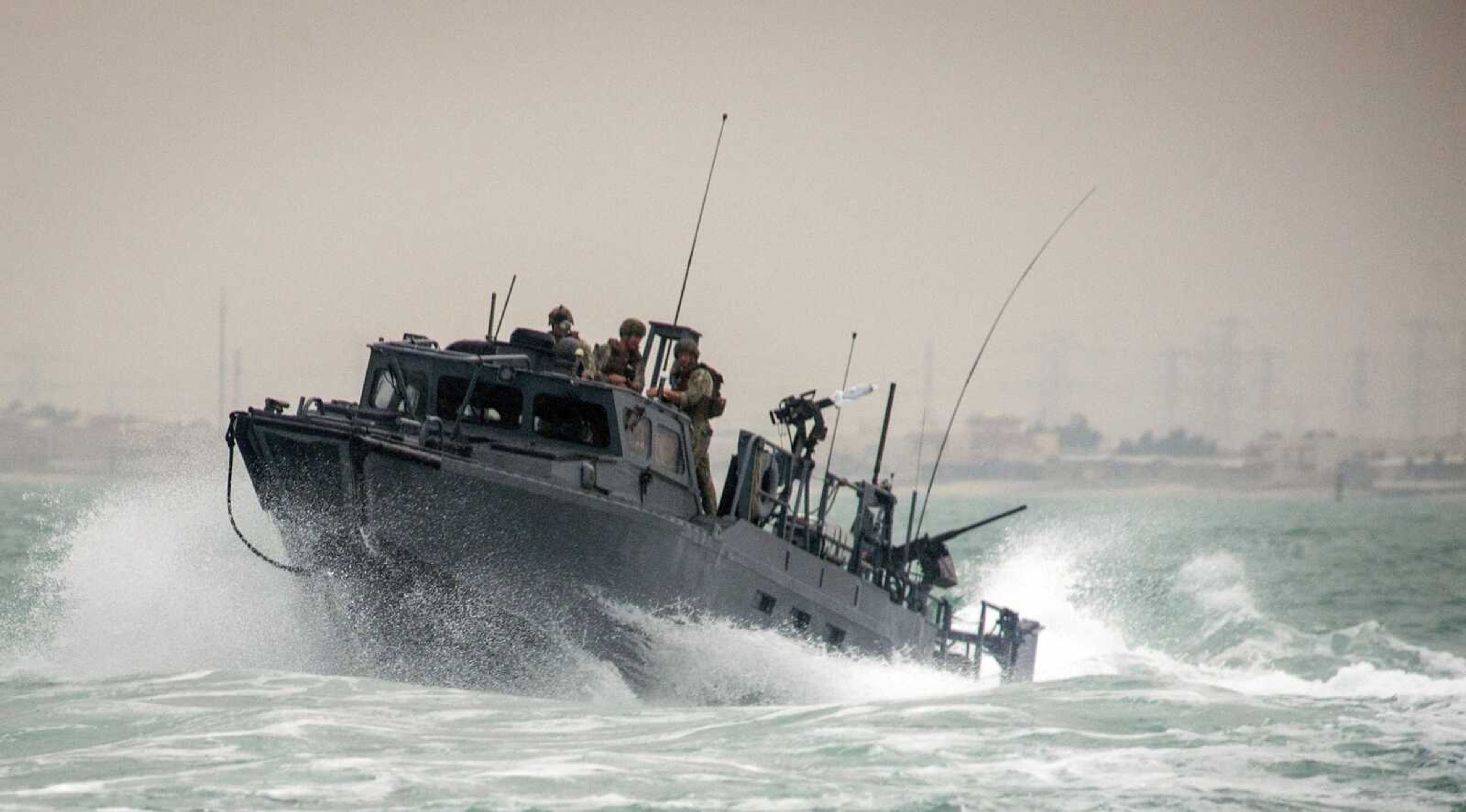 A Riverine Command Boat (RCB) 805 is shown transiting through rough seas during patrol operations in the Persian Gulf. Iran was holding 10 U.S. Navy sailors and their two boats, similar to the one in this picture, on Tuesday after the boats had mechanical problems and drifted into Iranian waters. American officials have received assurances from Tehran they will be returned safely and promptly. (Torrey W. Lee ~ U.S. Navy via AP)