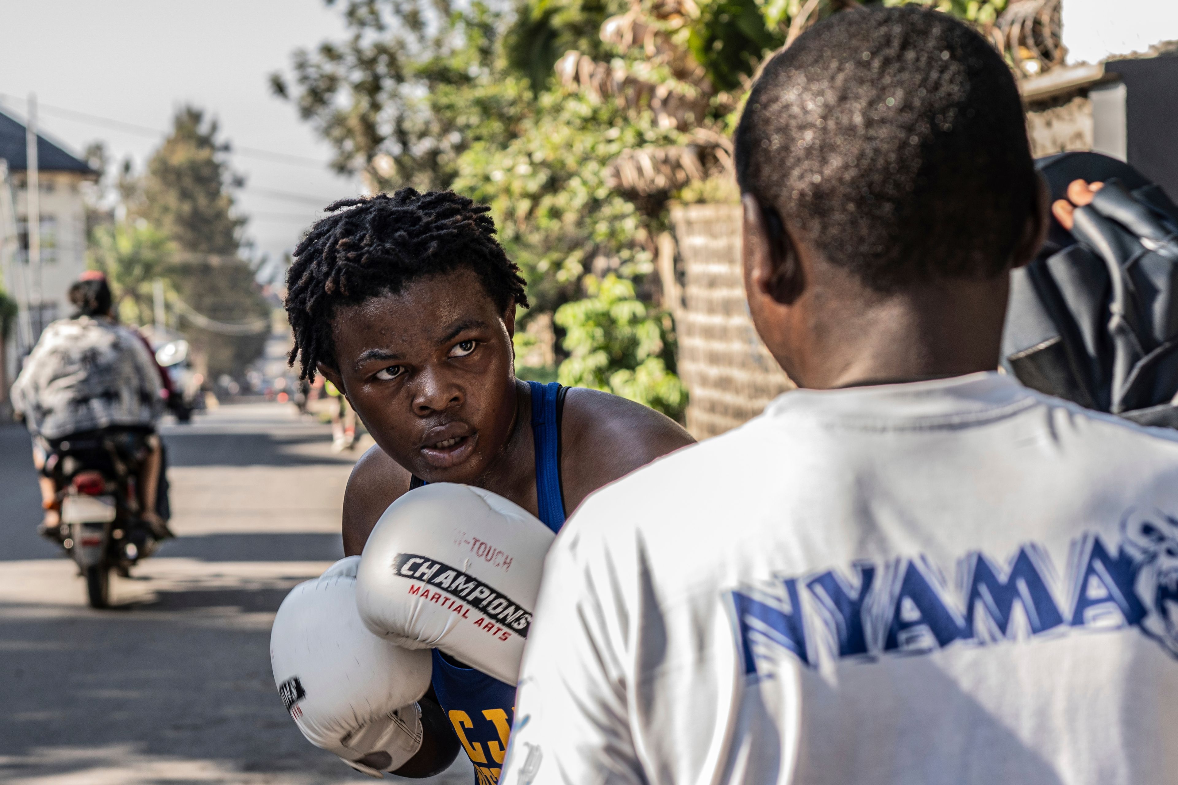 Daniella Mulekets, 20, practices Oct. 23, 2024 in the streets of Goma, Democratic republic of the Congo, prior to her first professional fight Oct. 26 on the 50th anniversary of the "Rumble in the Jungle" fight between Muhammad Ali and George Foreman in Kinshasa. (AP Photo/Moses Sawasawa)