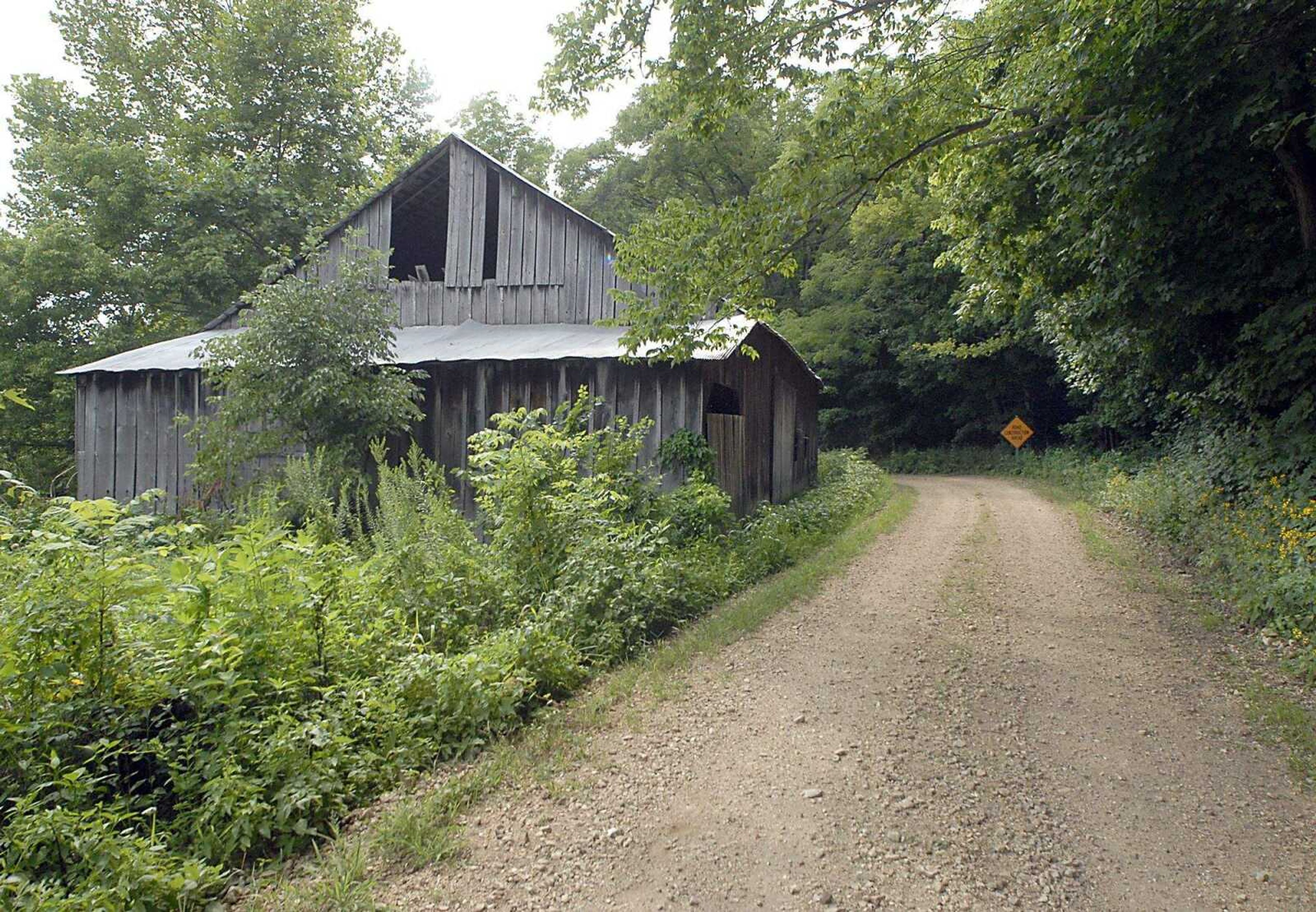 FRED LYNCH ~ flynch@semissourian.com
An old barn lies along County Road 532 just east of a creek bed that also served as the old road before it was redirected for one-half mile.