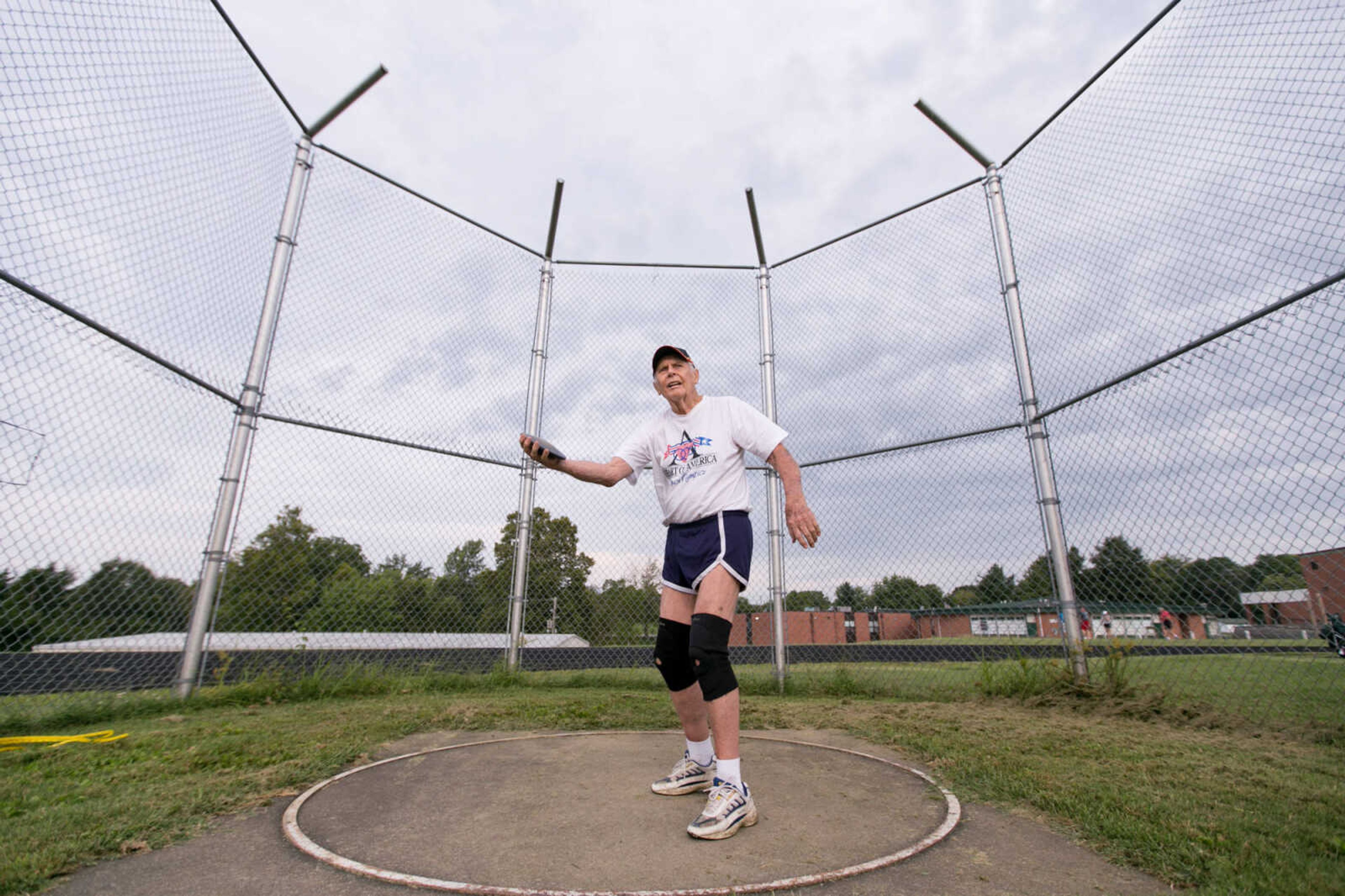 GLENN LANDBERG ~ glandberg@semissourian.com

Frank Bollinger, 87, winds up to throw the discus during the track and field events at the Southeast Missouri Senior Games in Perryville, Missouri Saturday, Aug. 22, 2015.